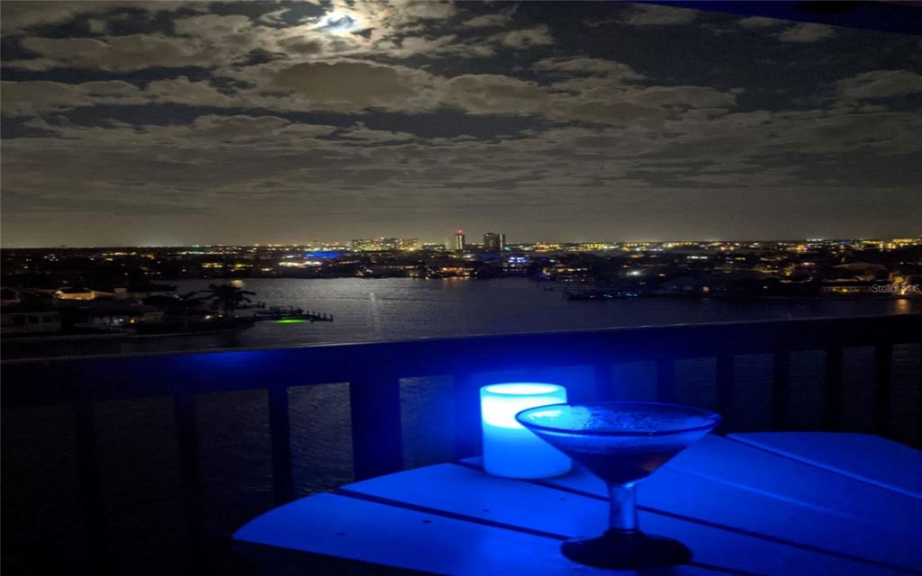 9415 Blind Pass Road, Unit 905 St. Pete Beach, FL 33706 - Photo 49 of 51 a view of a living room with furniture