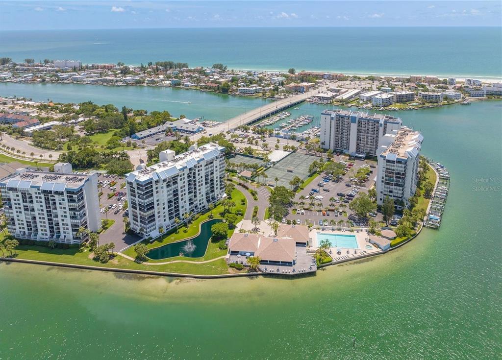 9415 Blind Pass Road, Unit 905 St. Pete Beach, FL 33706 - Photo 50 of 51 a view of a city with an ocean view