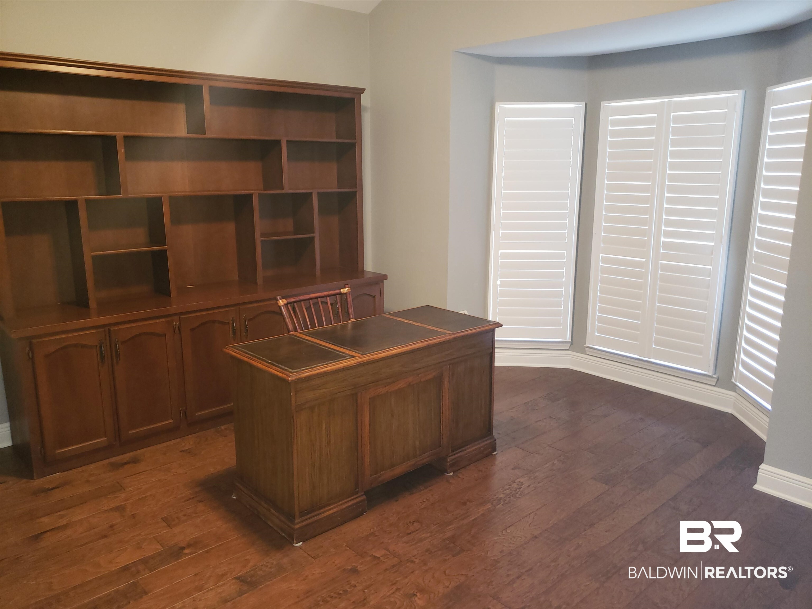 23373 Dundee Circle Foley, AL 36535 - Photo 16 of 34 Flex Room off Foyer for office / library w desk and book shelf.