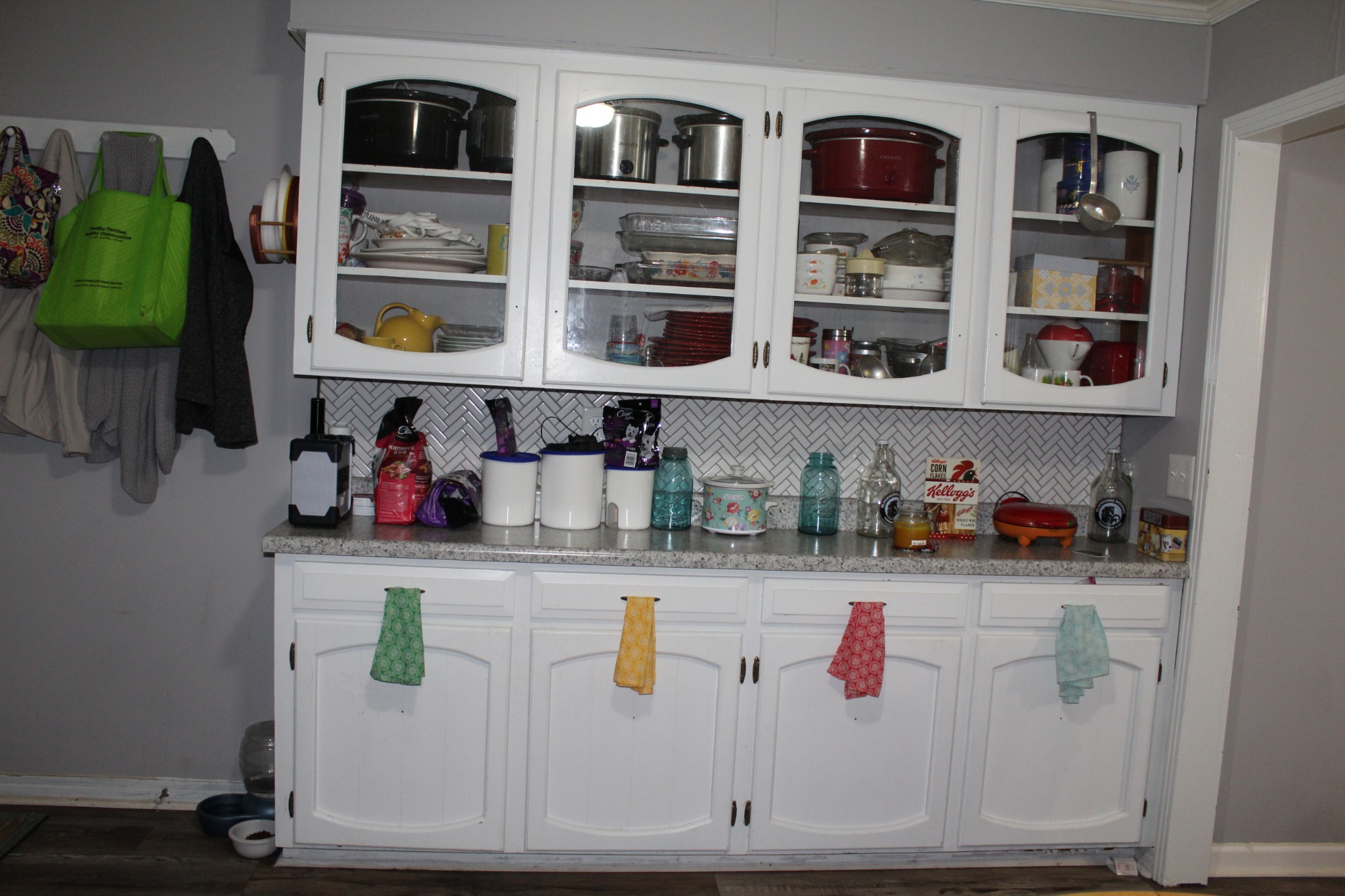 115 Day Lane Tennessee Ridge, TN 37178 - Photo 7 of 22 a cabinet with white cabinets and wooden floor