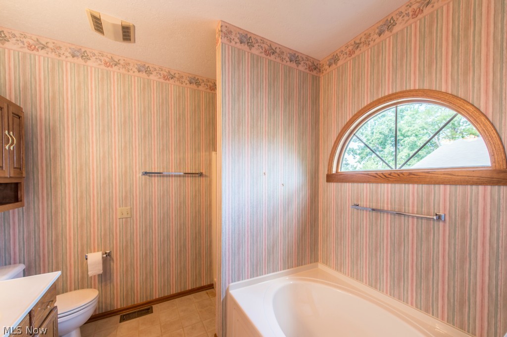 2423 Charing Cross Road Northwest, Unit 79 Canton, OH 44708 - Photo 18 of 25 Master Bath & Linen Closet