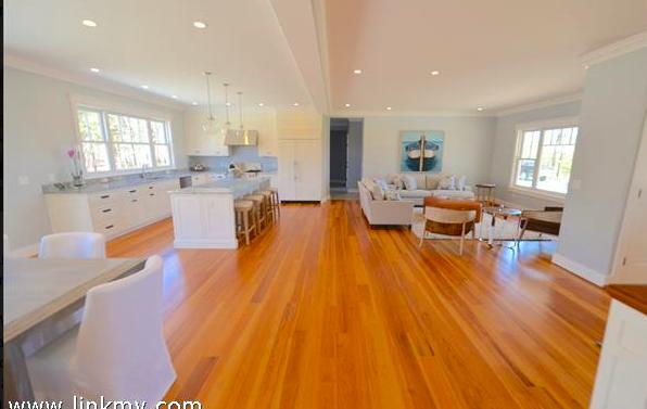 25 Meshacket Road Edgartown, MA 02539 - Photo 10 of 27 a large living room with stainless steel appliances furniture a couch and a large window