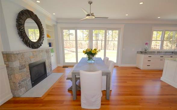 25 Meshacket Road Edgartown, MA 02539 - Photo 12 of 27 a living room with furniture and a fireplace