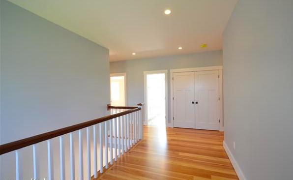 25 Meshacket Road Edgartown, MA 02539 - Photo 13 of 27 a view of a hallway with wooden floor