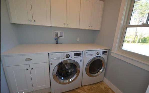 25 Meshacket Road Edgartown, MA 02539 - Photo 16 of 27 a utility room with dryer and washer