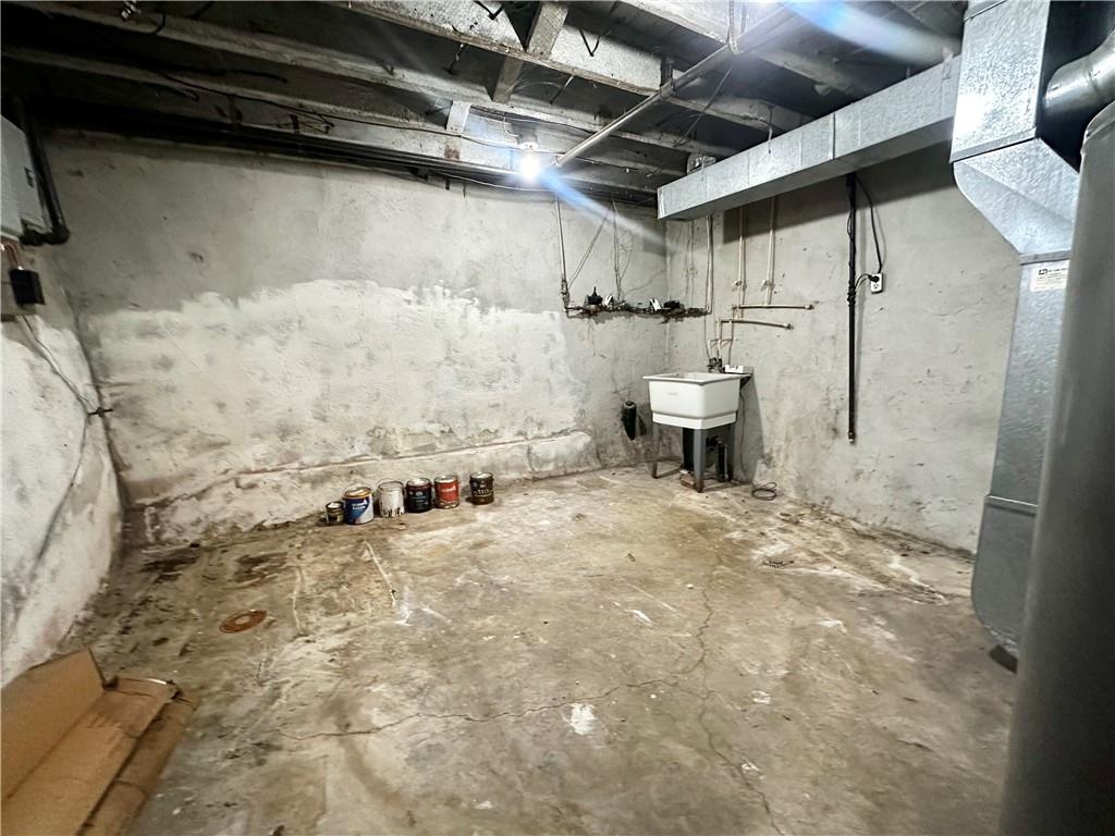 212-214 Friday Road Pittsburgh, PA 15209 - Photo 18 of 26 STORAGE AREA WITH UTILITIES IN LOWER LEVEL