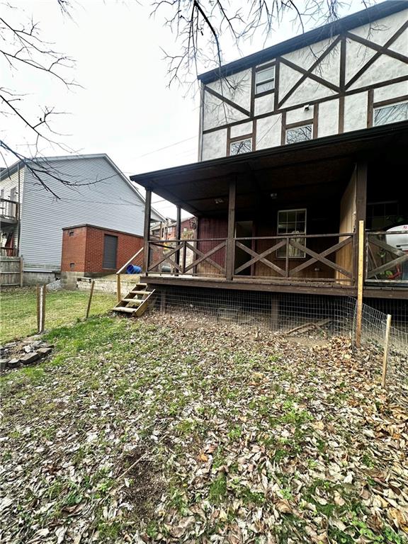 212-214 Friday Road Pittsburgh, PA 15209 - Photo 21 of 26 DECK OFF OF THE KTICHEN ON THE LOWER LEVEL WITH A FENCED IN BACKYARD