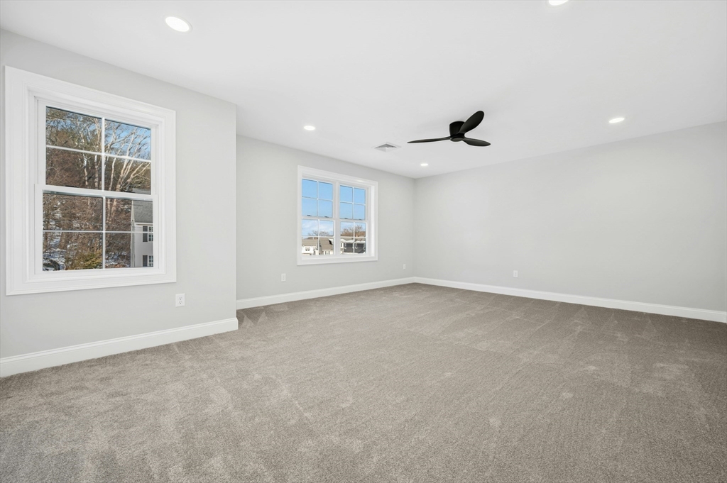 2 B Wilson Road, Unit B Millbury, MA 01527 - Photo 22 of 40 a view of an empty room with a window
