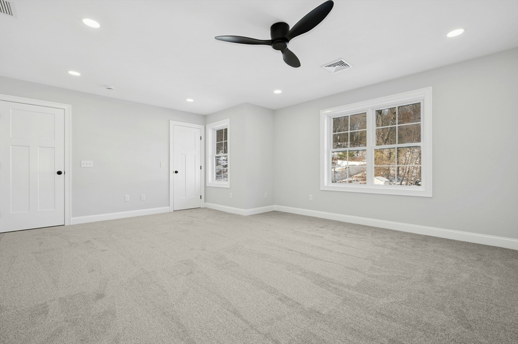 2 B Wilson Road, Unit B Millbury, MA 01527 - Photo 23 of 40 a view of an empty room with a window
