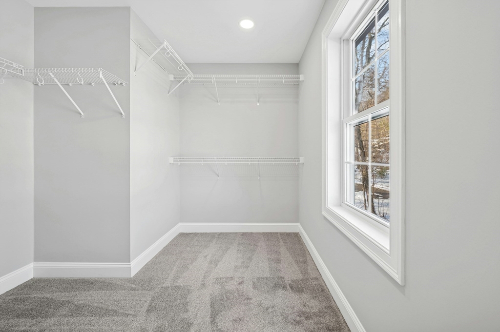 2 B Wilson Road, Unit B Millbury, MA 01527 - Photo 25 of 40 a view of an empty room with a window