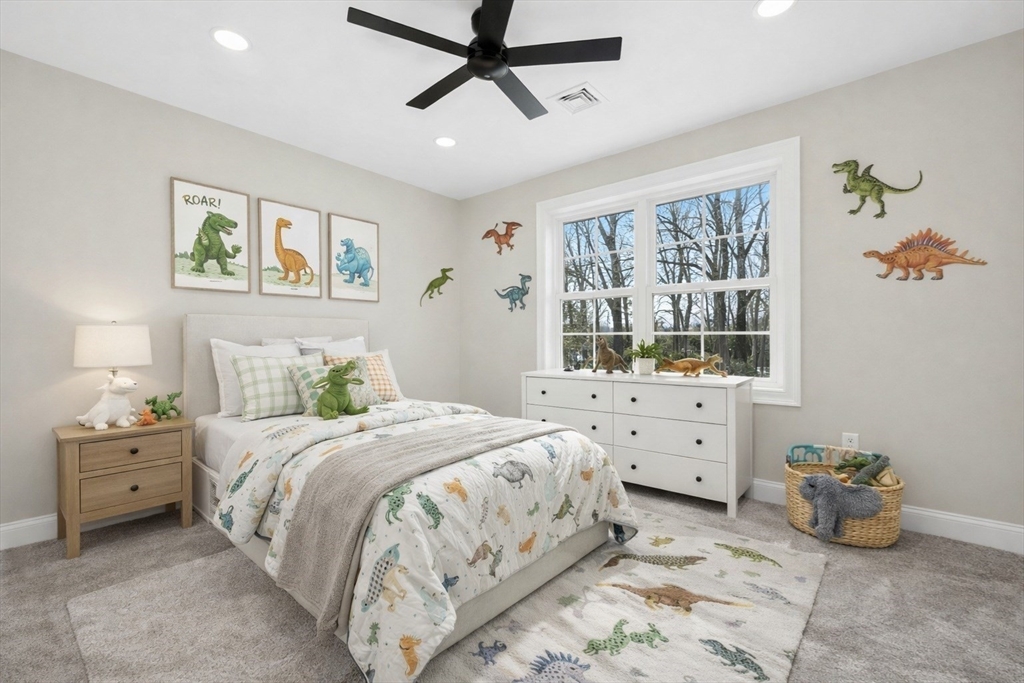 2 B Wilson Road, Unit B Millbury, MA 01527 - Photo 31 of 40 a bedroom with a bed and a window