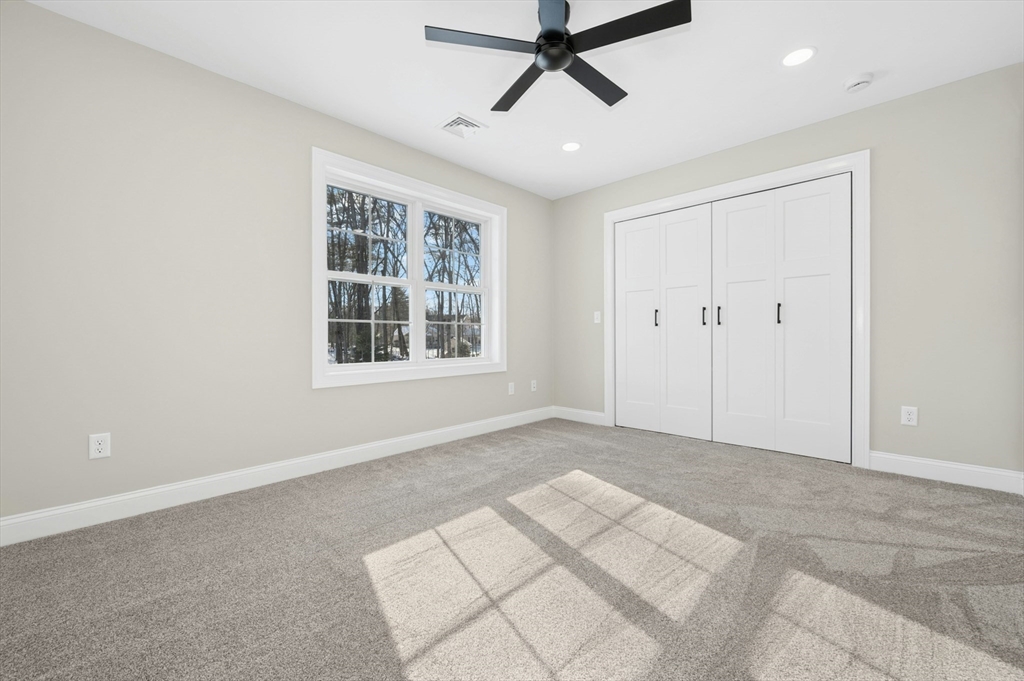 2 B Wilson Road, Unit B Millbury, MA 01527 - Photo 33 of 40 a view of an empty room with a window