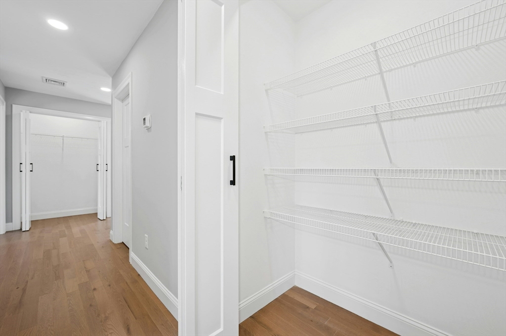 2 B Wilson Road, Unit B Millbury, MA 01527 - Photo 35 of 40 a view of a room with wooden floor