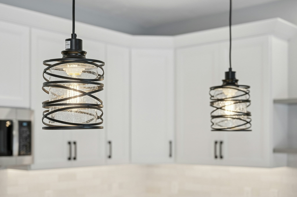 2 B Wilson Road, Unit B Millbury, MA 01527 - Photo 7 of 40 a front view of a house with entryway