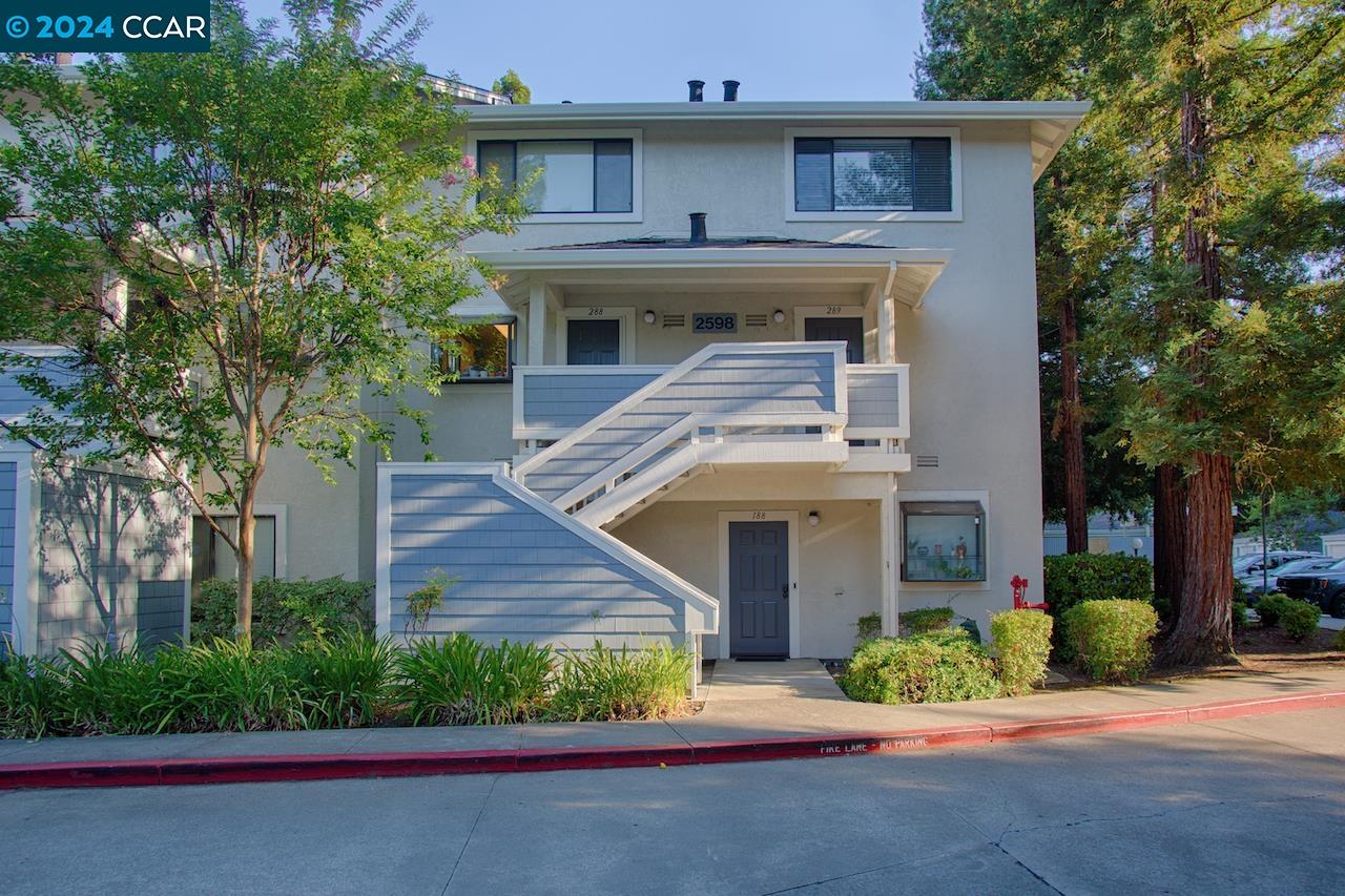 2598 Oak Road, Unit 289 Walnut Creek, CA 94597 - Photo 1 of 1 front view of a house with a yard