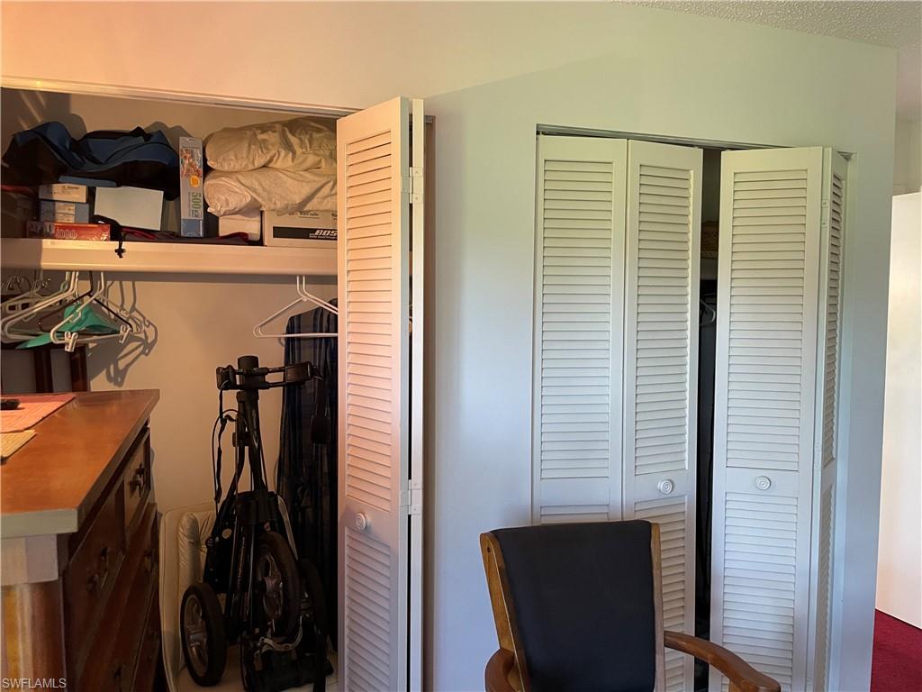 126 Teryl Road, Unit 3 Naples, FL 34112 - Photo 8 of 13 Extra closets in Master Bedroom