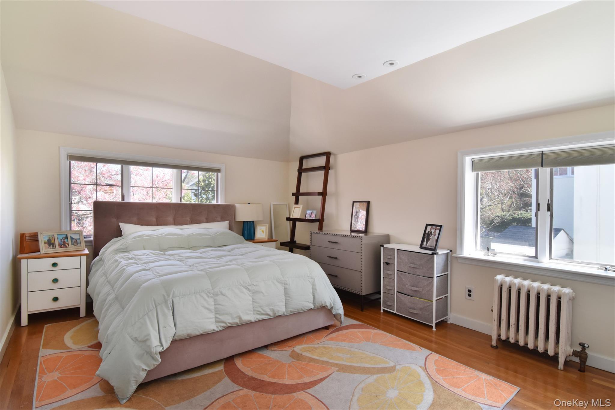 74 Kensington Road Bronxville, NY 10708 - Photo 21 of 33 a bedroom with a bed and a window