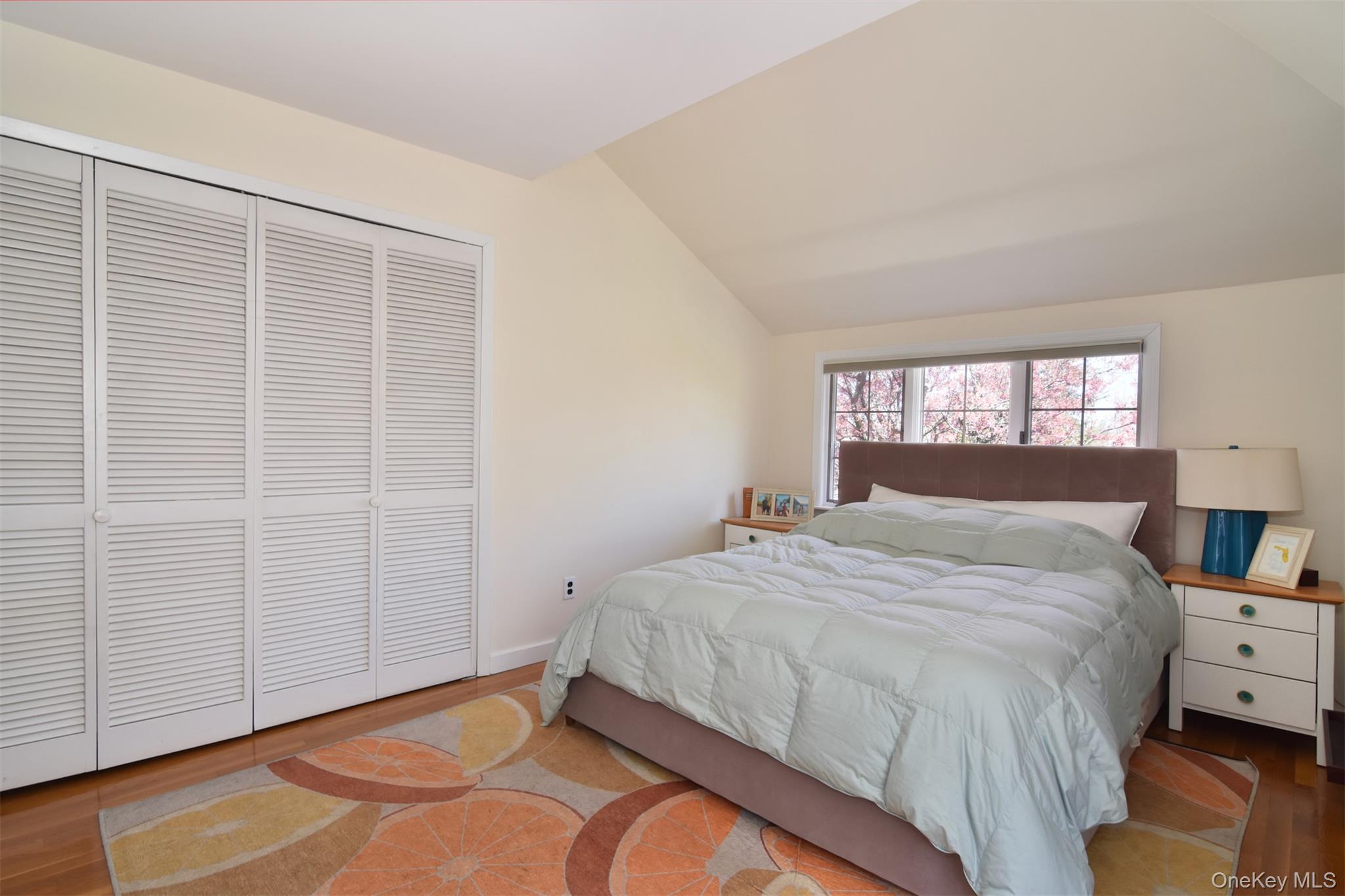 74 Kensington Road Bronxville, NY 10708 - Photo 22 of 33 a bedroom with a bed and a window