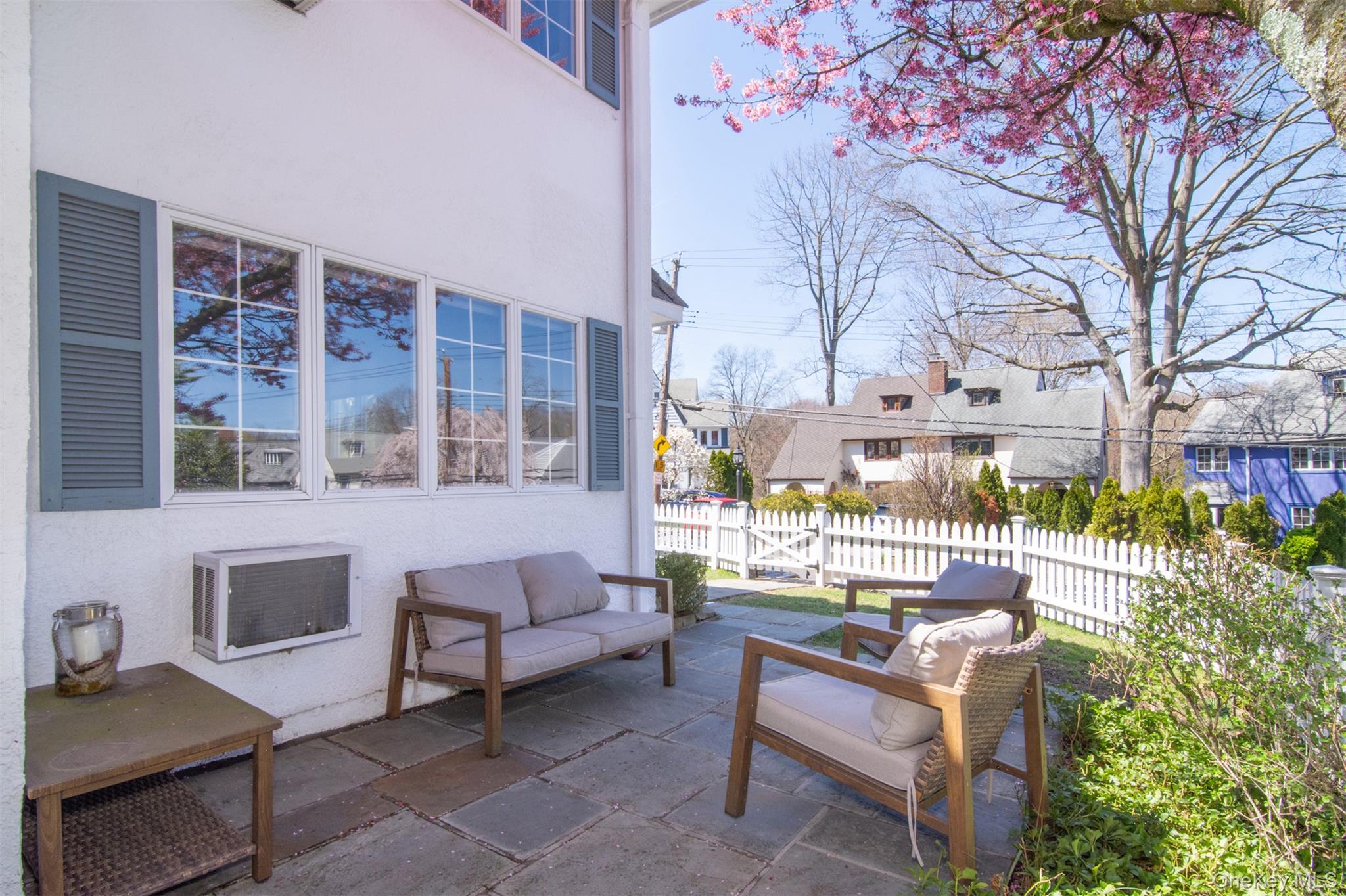 74 Kensington Road Bronxville, NY 10708 - Photo 28 of 33 a view of a building with outdoor seating