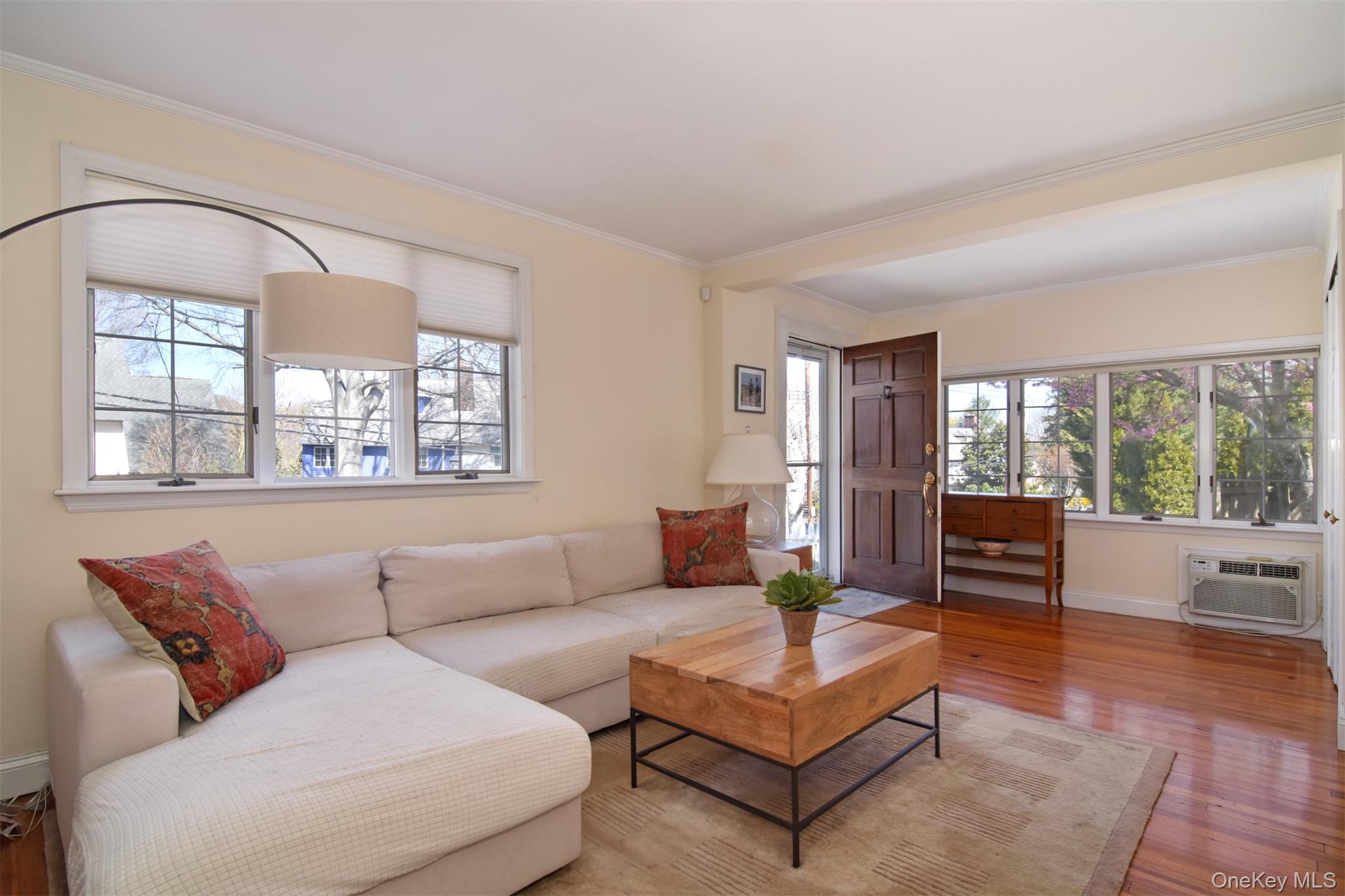 74 Kensington Road Bronxville, NY 10708 - Photo 7 of 33 a living room with furniture and a large window