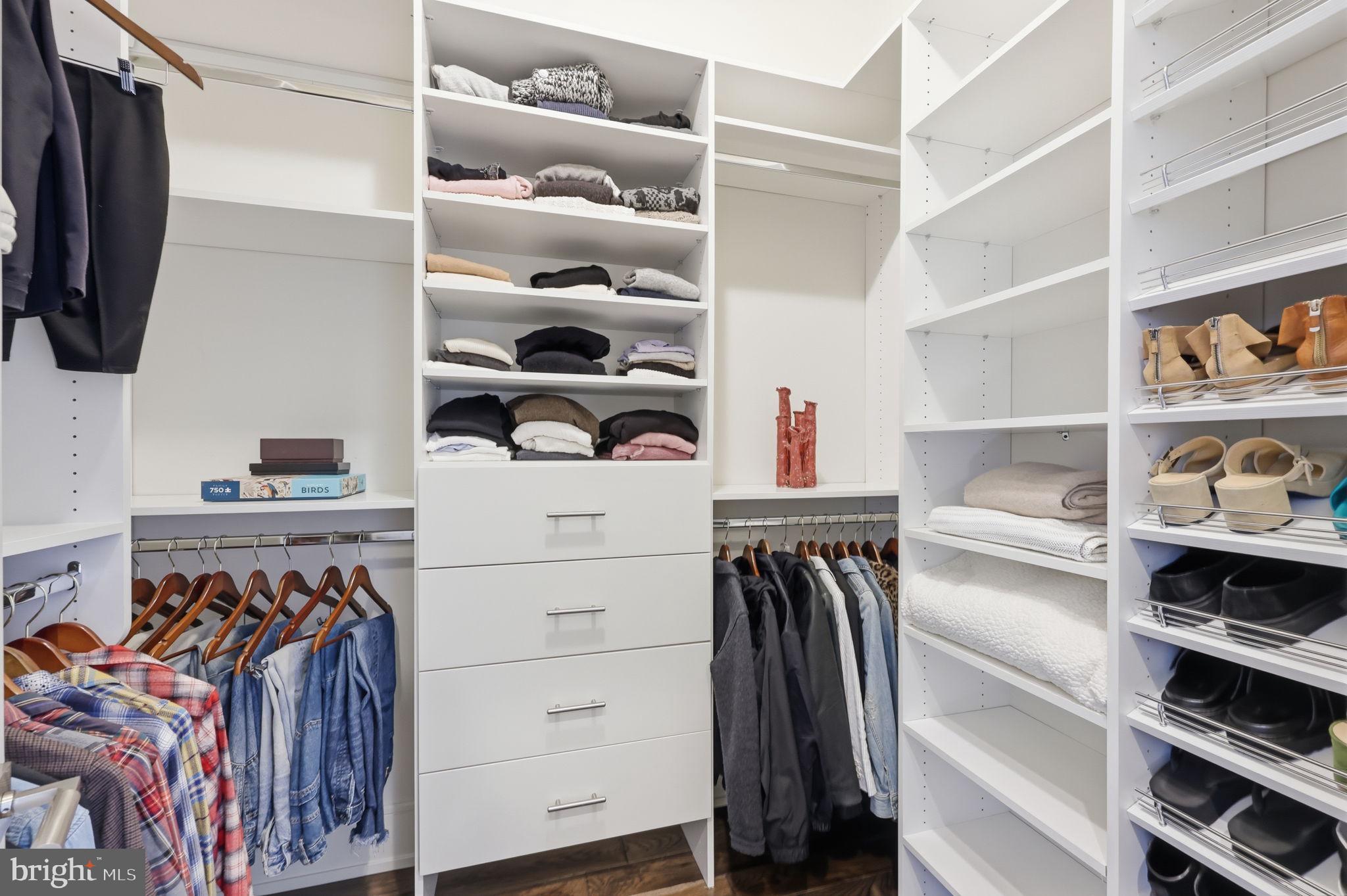 94 East Street Doylestown, PA 18901 - Photo 11 of 65 a view of walk in closet with clothes and shoes