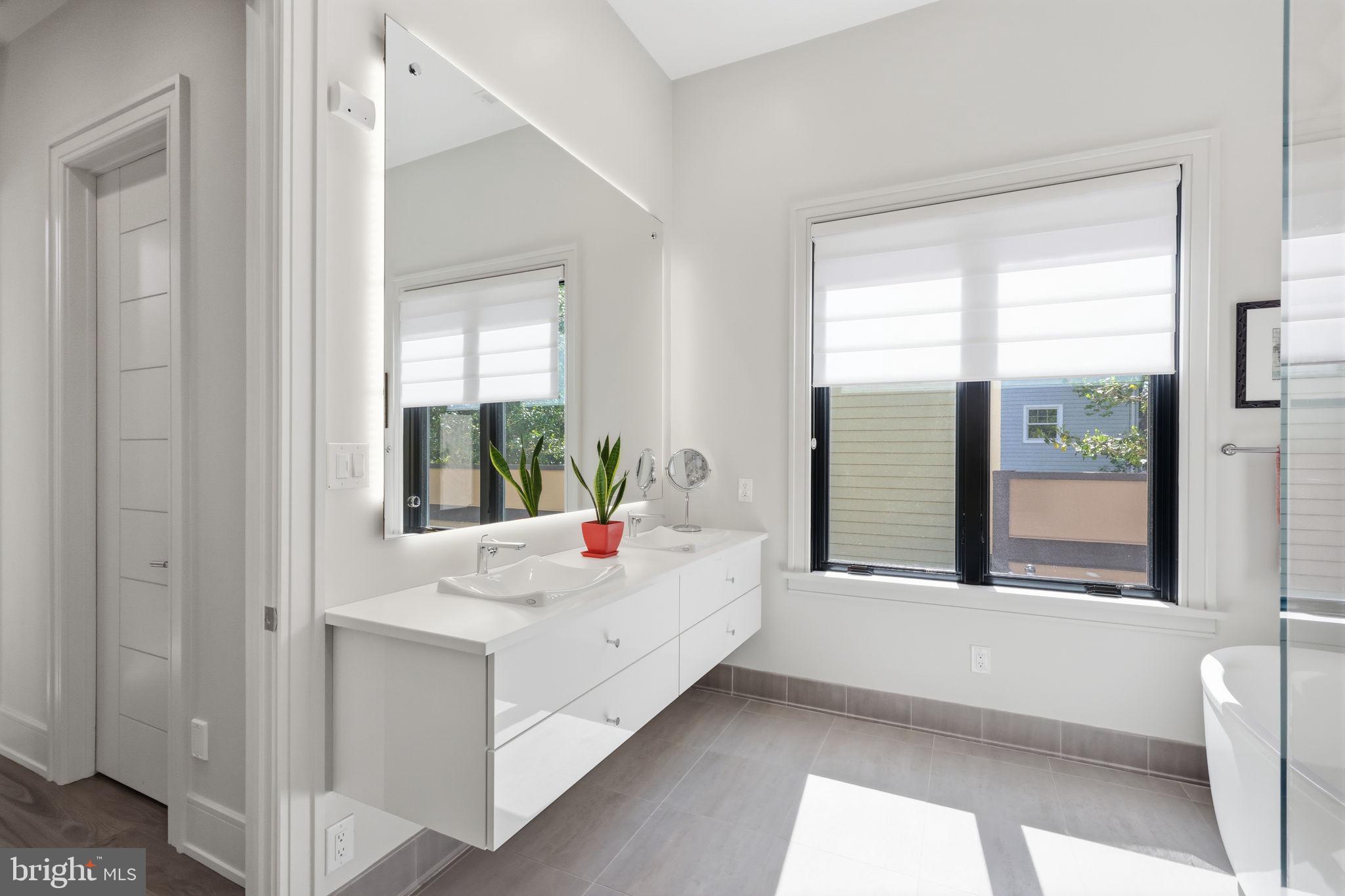94 East Street Doylestown, PA 18901 - Photo 13 of 65 a en suite bathroom with a bathtub and mirror