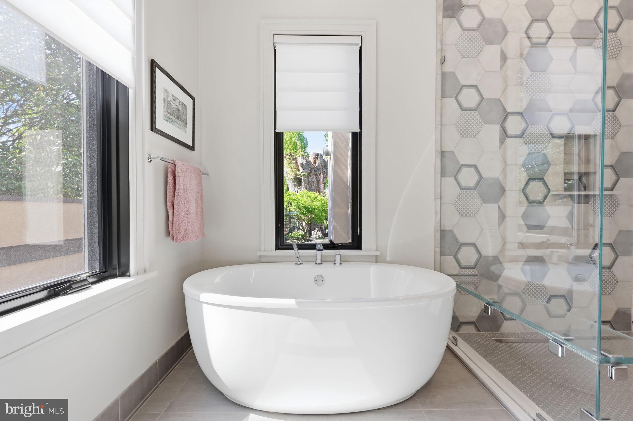 94 East Street Doylestown, PA 18901 - Photo 15 of 65 a white bath tub sitting next to a window