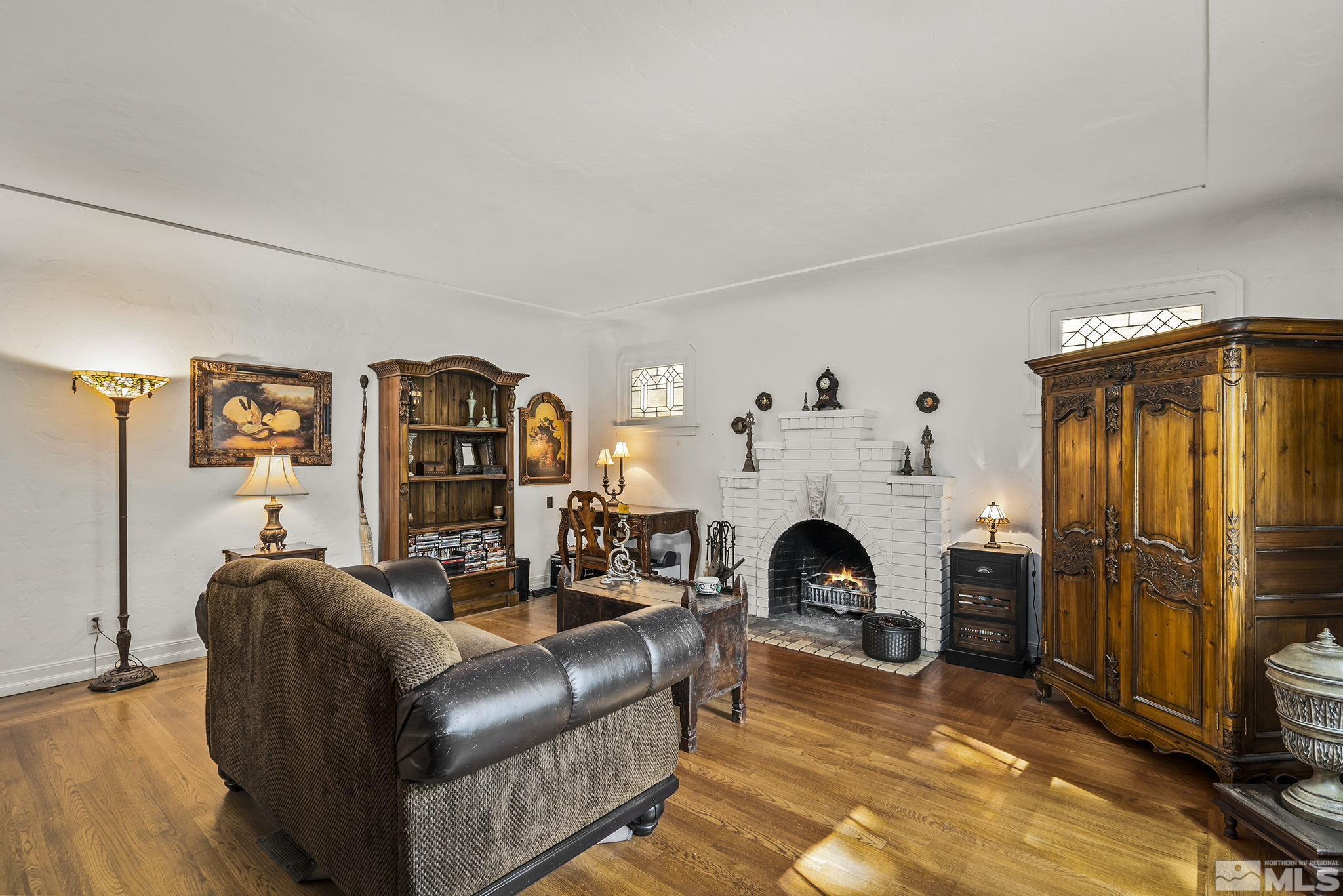 1015 Forest Street Reno, NV 89509 - Photo 5 of 22 a living room with furniture and a fireplace