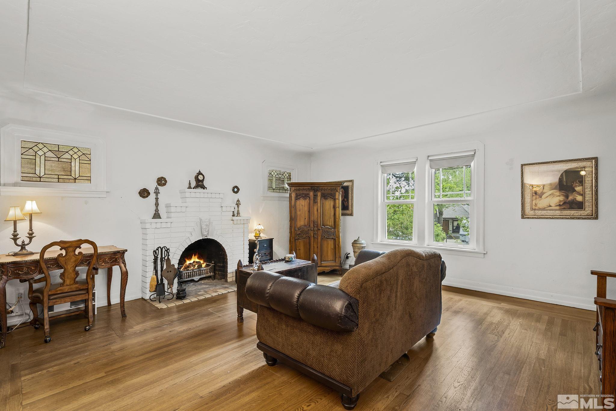 1015 Forest Street Reno, NV 89509 - Photo 6 of 22 a living room with furniture and a fireplace