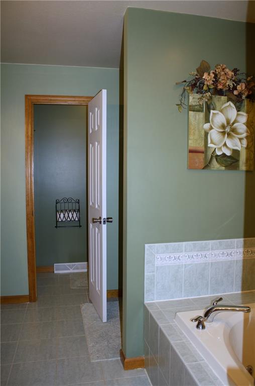 157 Robinson Run Road Butler, PA 16002 - Photo 13 of 24 Master Bathroom with jet spray tub, separate toilet room,double sinks, and linen closet.