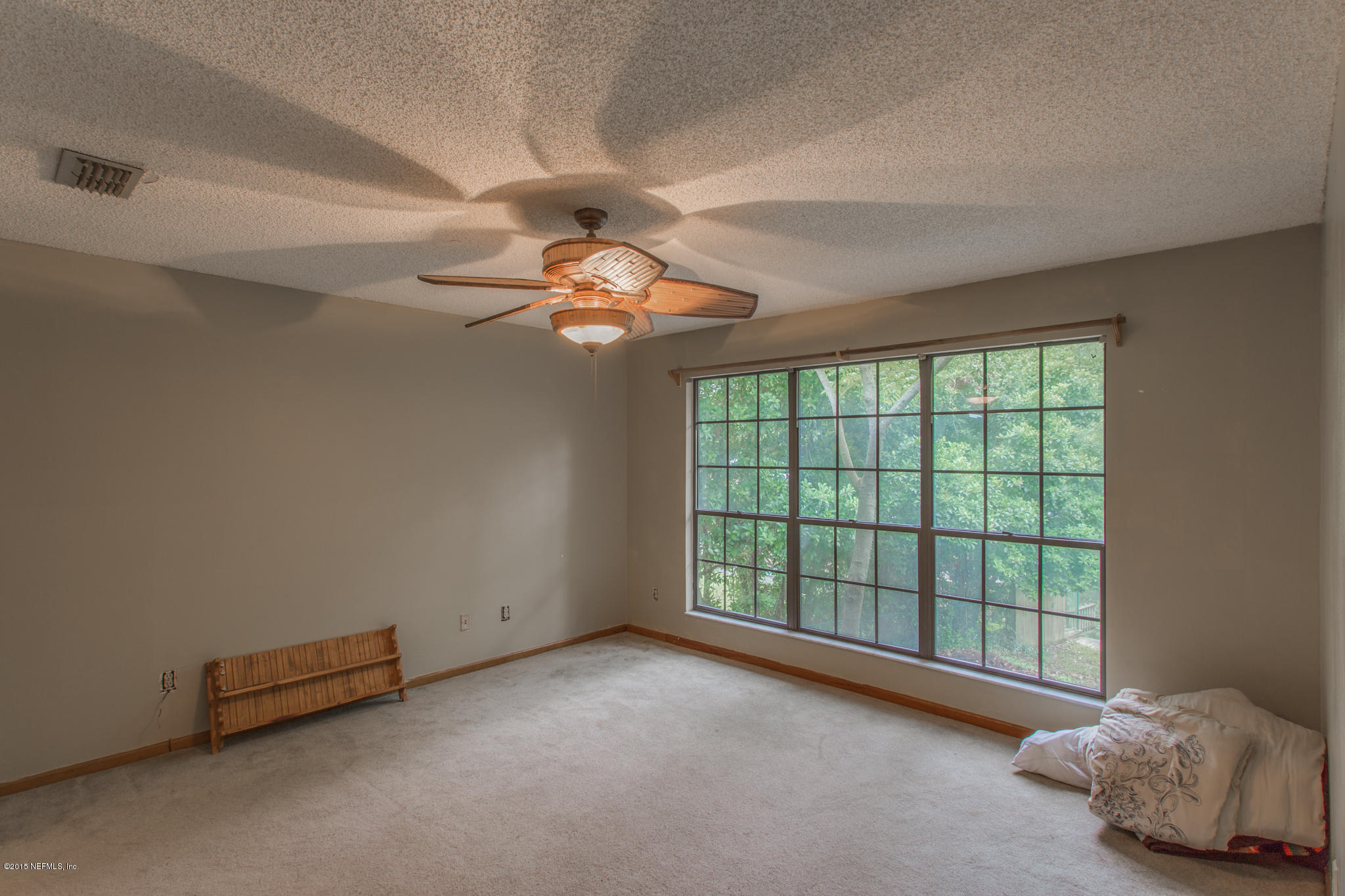 2046 Cornell Road Middleburg, FL 32068 - Photo 7 of 41 a view of an empty room with a window