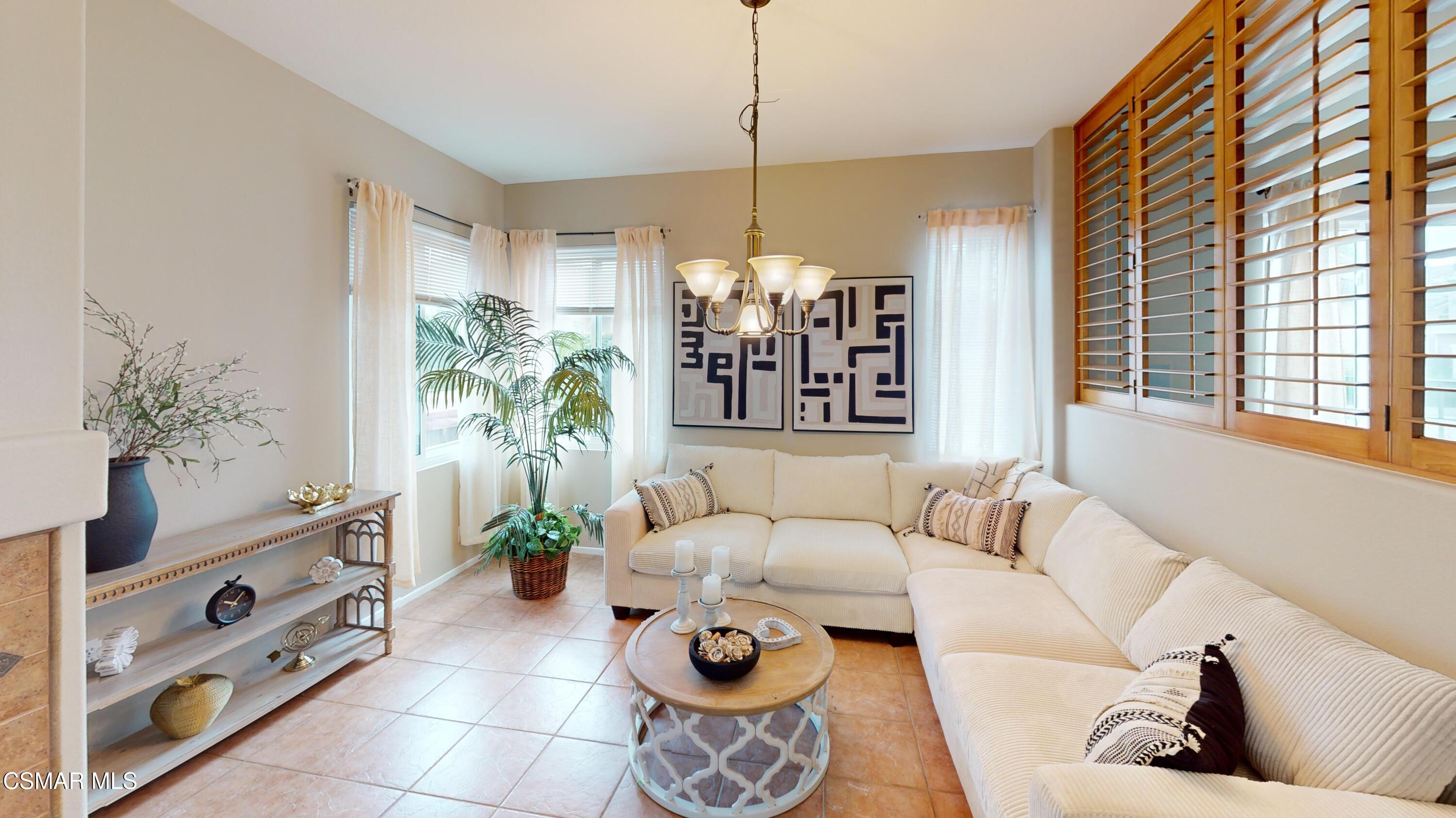 1708 Starpine Way Simi Valley, CA 93065 - Photo 15 of 60 a living room with furniture and a potted plant