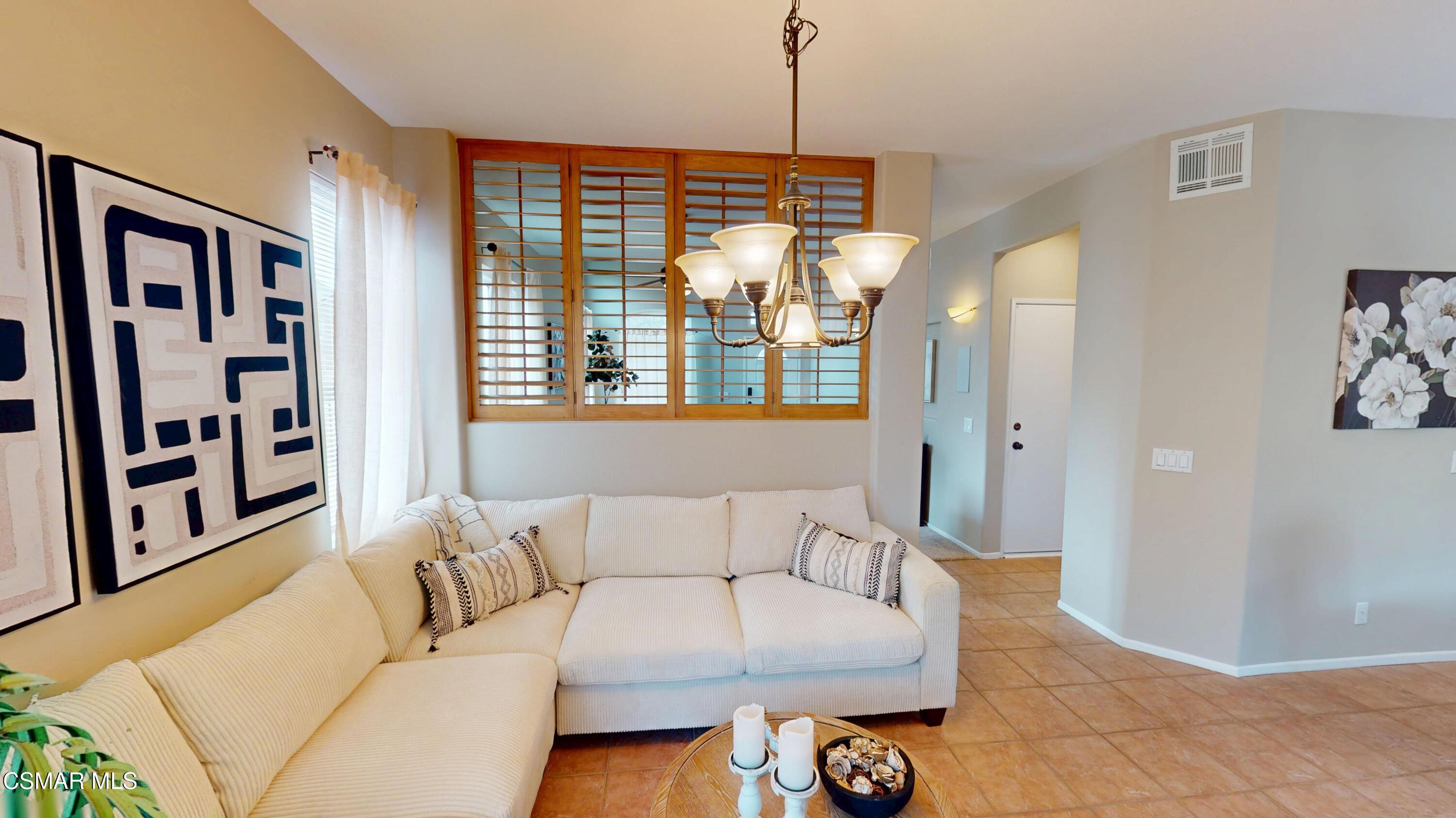 1708 Starpine Way Simi Valley, CA 93065 - Photo 17 of 60 a living room with furniture and large window