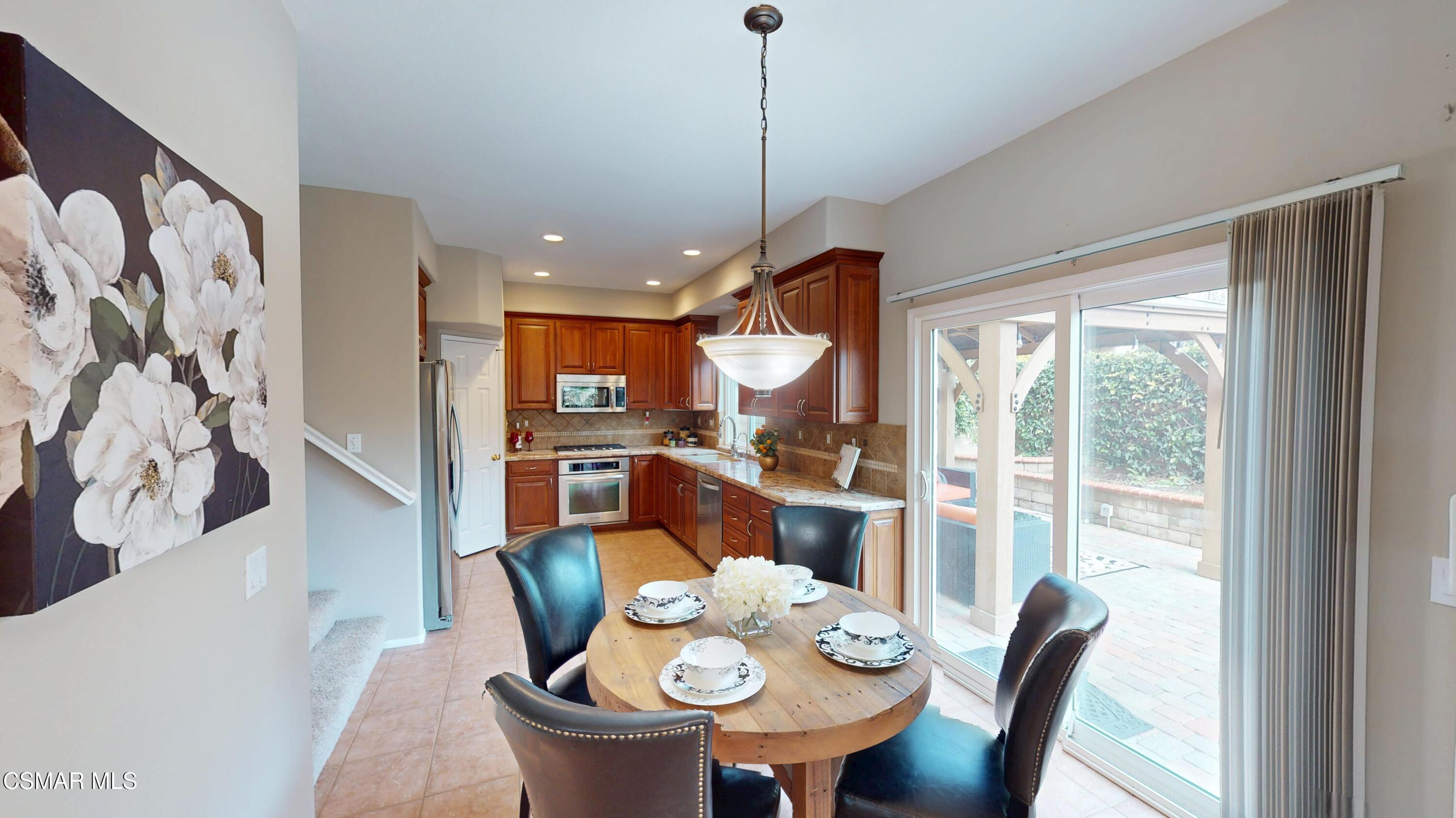 1708 Starpine Way Simi Valley, CA 93065 - Photo 20 of 60 a dining room with furniture a window and kitchen view