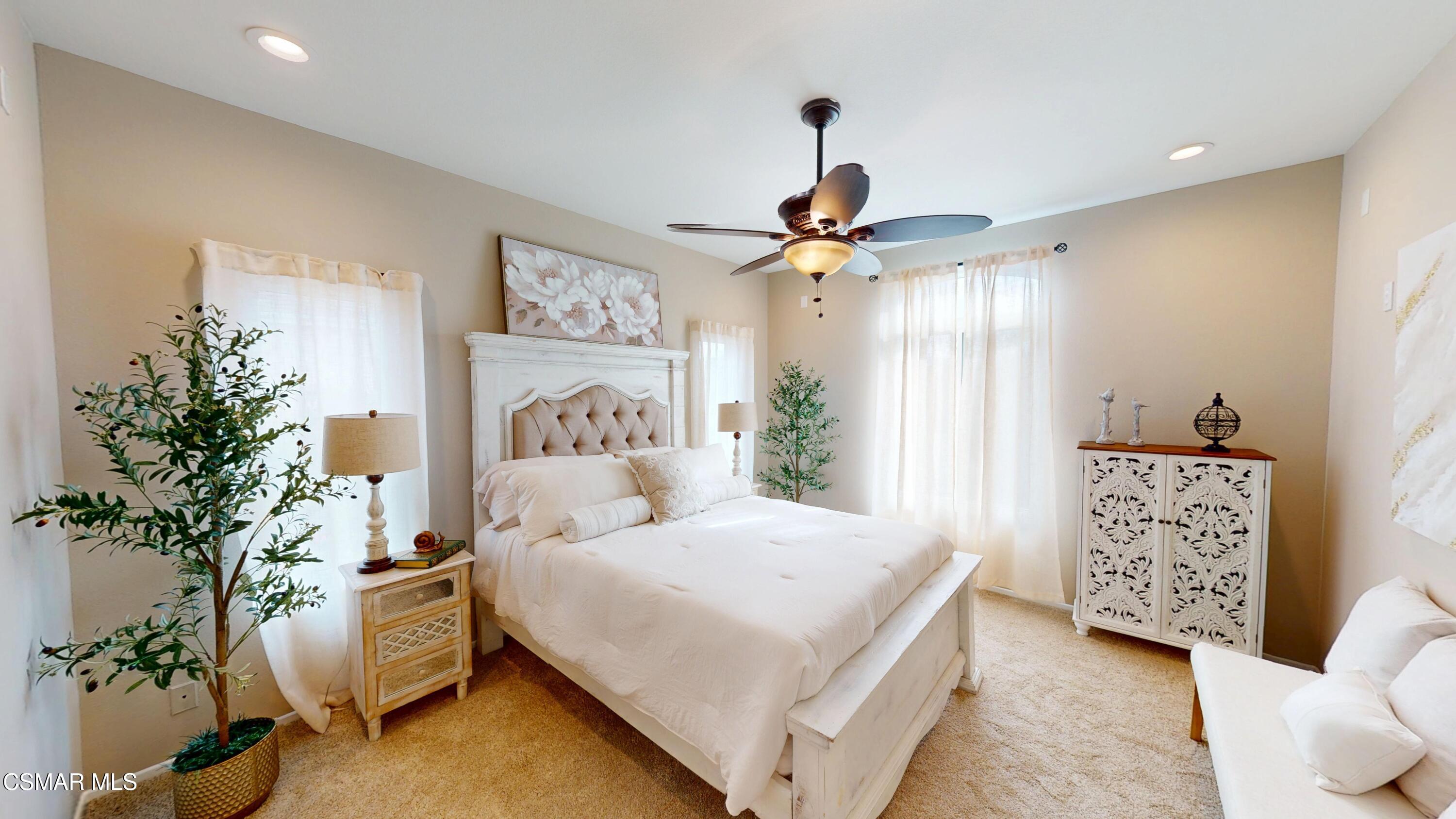 1708 Starpine Way Simi Valley, CA 93065 - Photo 29 of 60 a bedroom with a bed and a chandelier