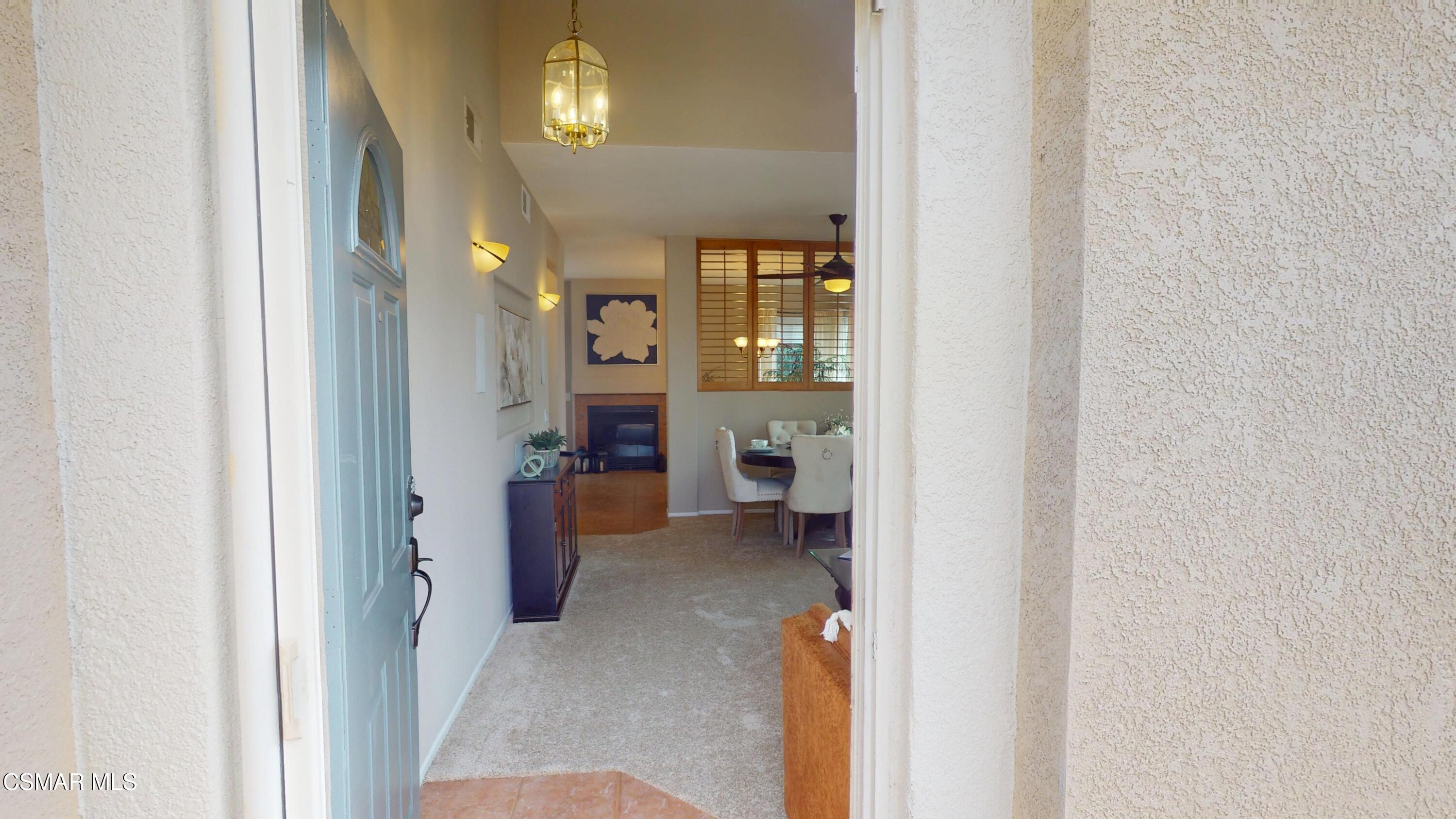 1708 Starpine Way Simi Valley, CA 93065 - Photo 3 of 60 a view of a hallway with living room and utility room