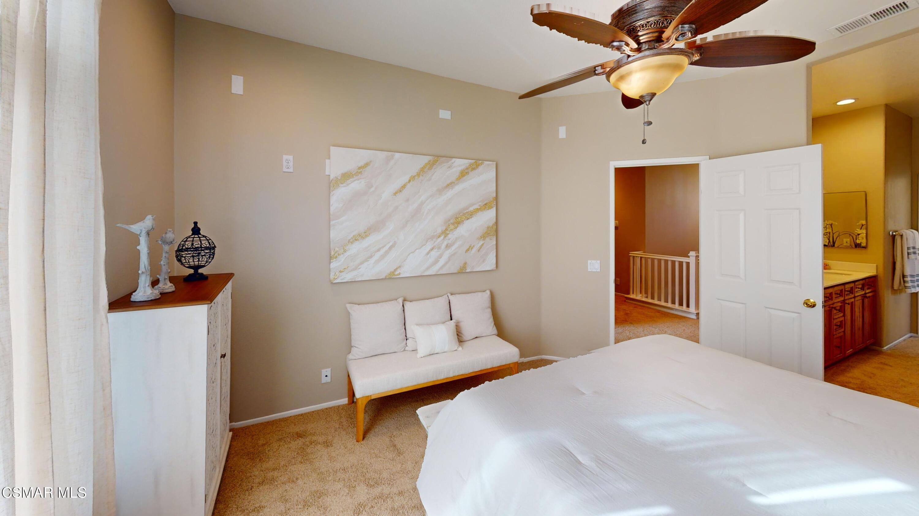 1708 Starpine Way Simi Valley, CA 93065 - Photo 31 of 60 a bedroom with a bed and a chandelier