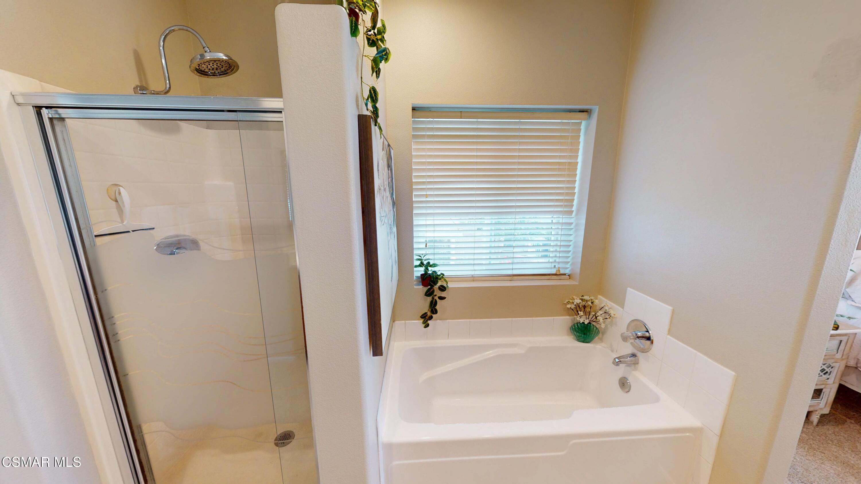 1708 Starpine Way Simi Valley, CA 93065 - Photo 36 of 60 a bathroom with a bathtub and a shower