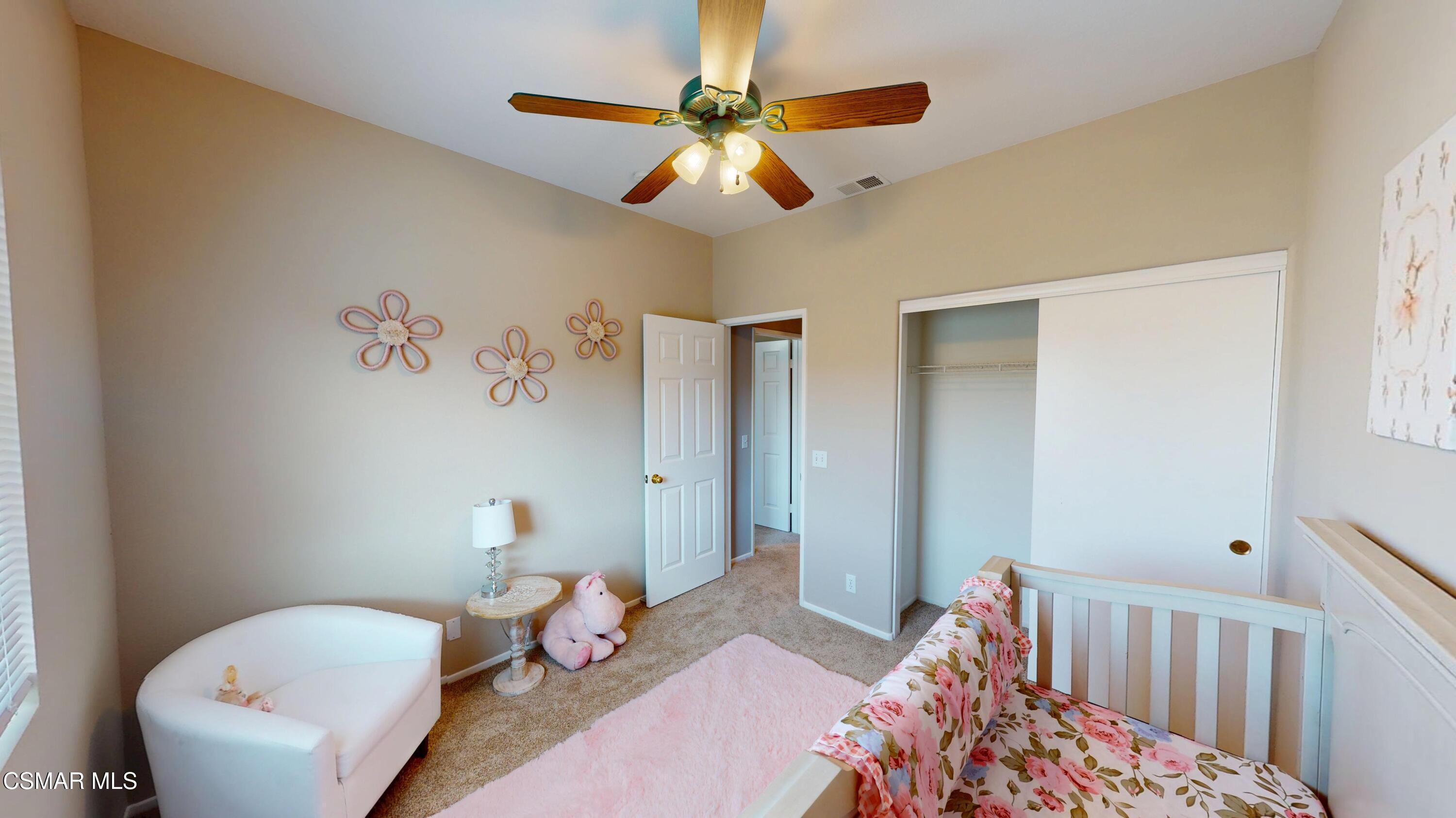 1708 Starpine Way Simi Valley, CA 93065 - Photo 40 of 60 a bedroom with a bed and a chandelier