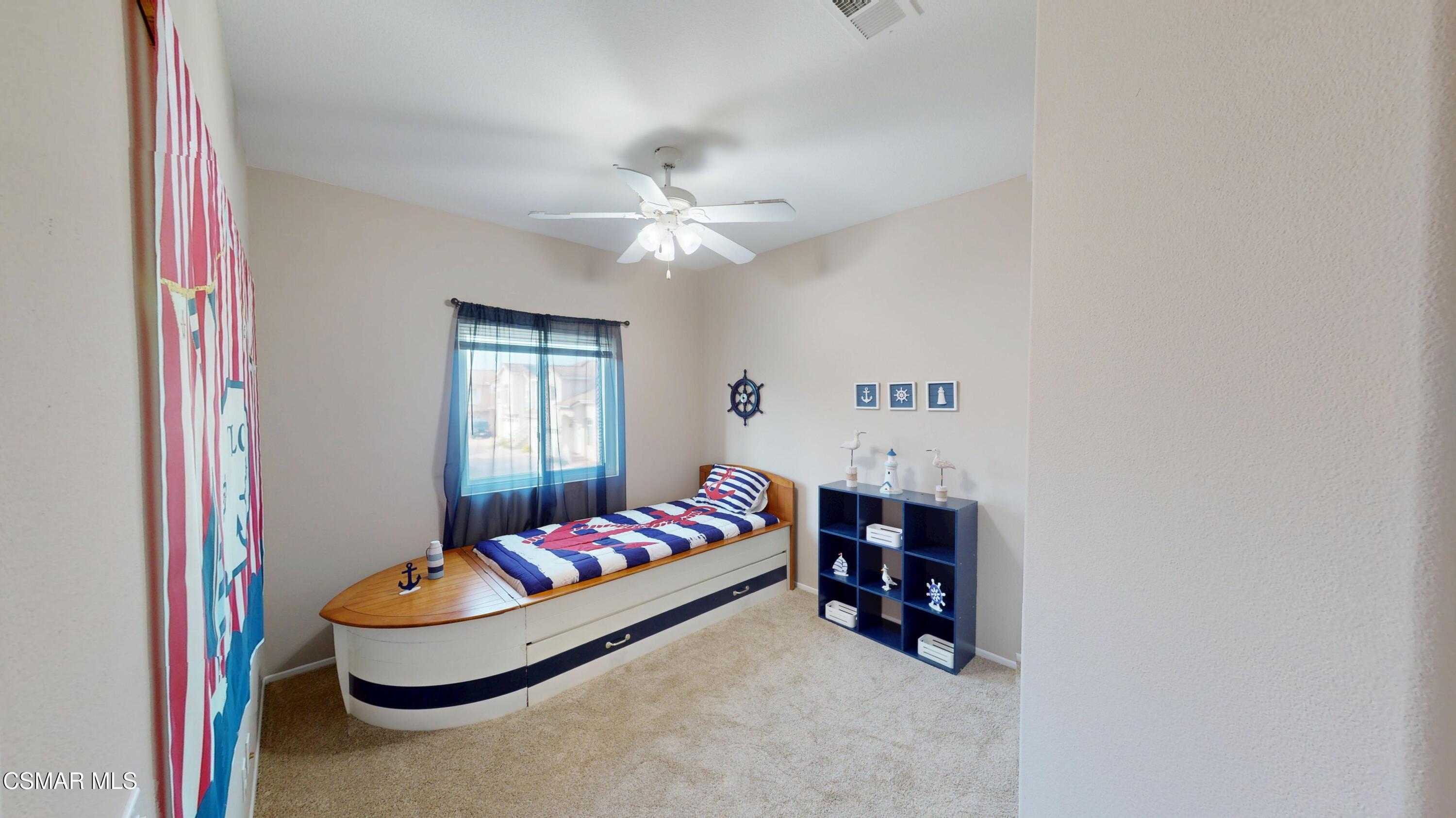 1708 Starpine Way Simi Valley, CA 93065 - Photo 41 of 60 a bedroom with furniture and a chandelier
