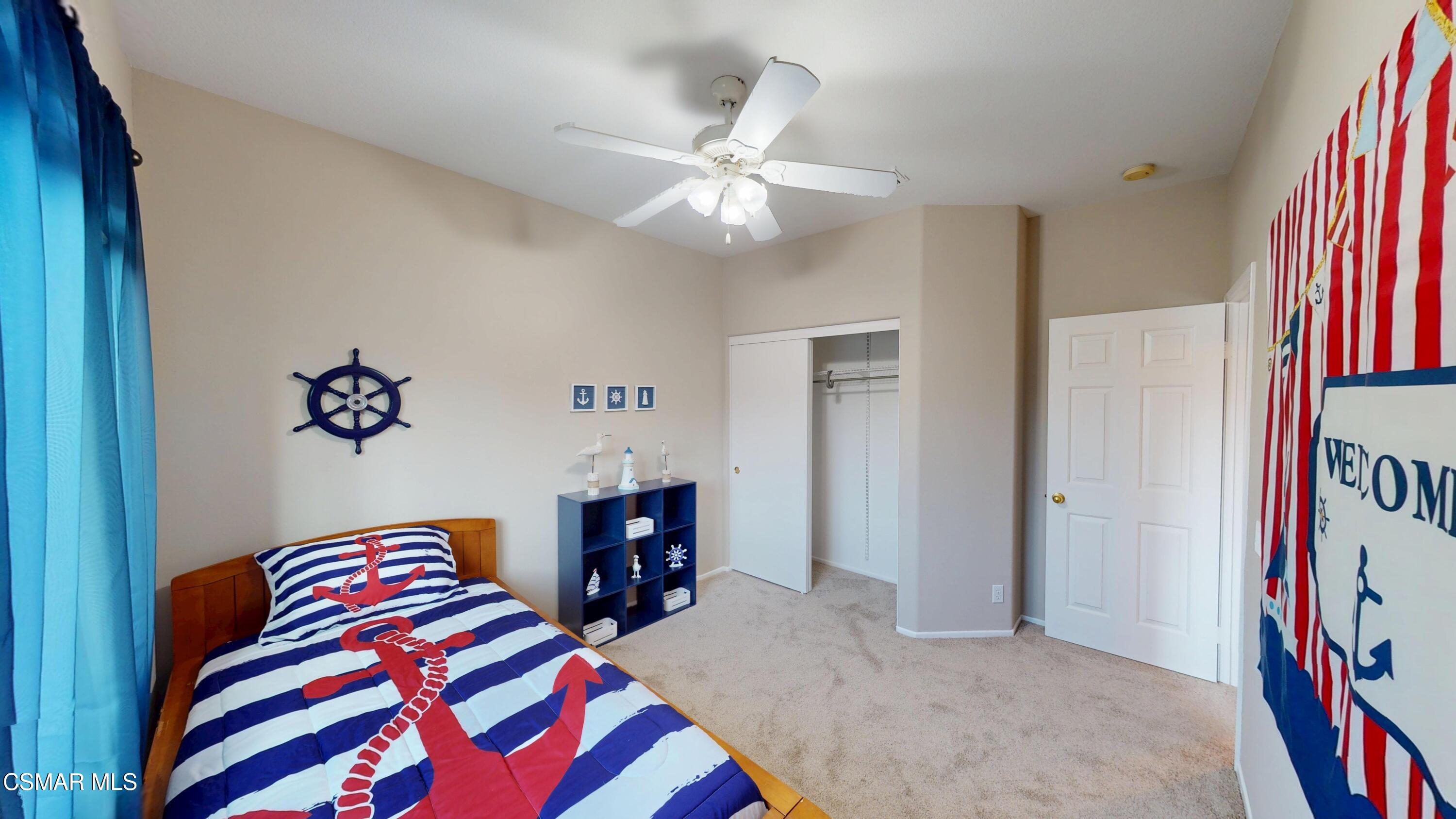 1708 Starpine Way Simi Valley, CA 93065 - Photo 42 of 60 a bedroom with a bed and a chandelier