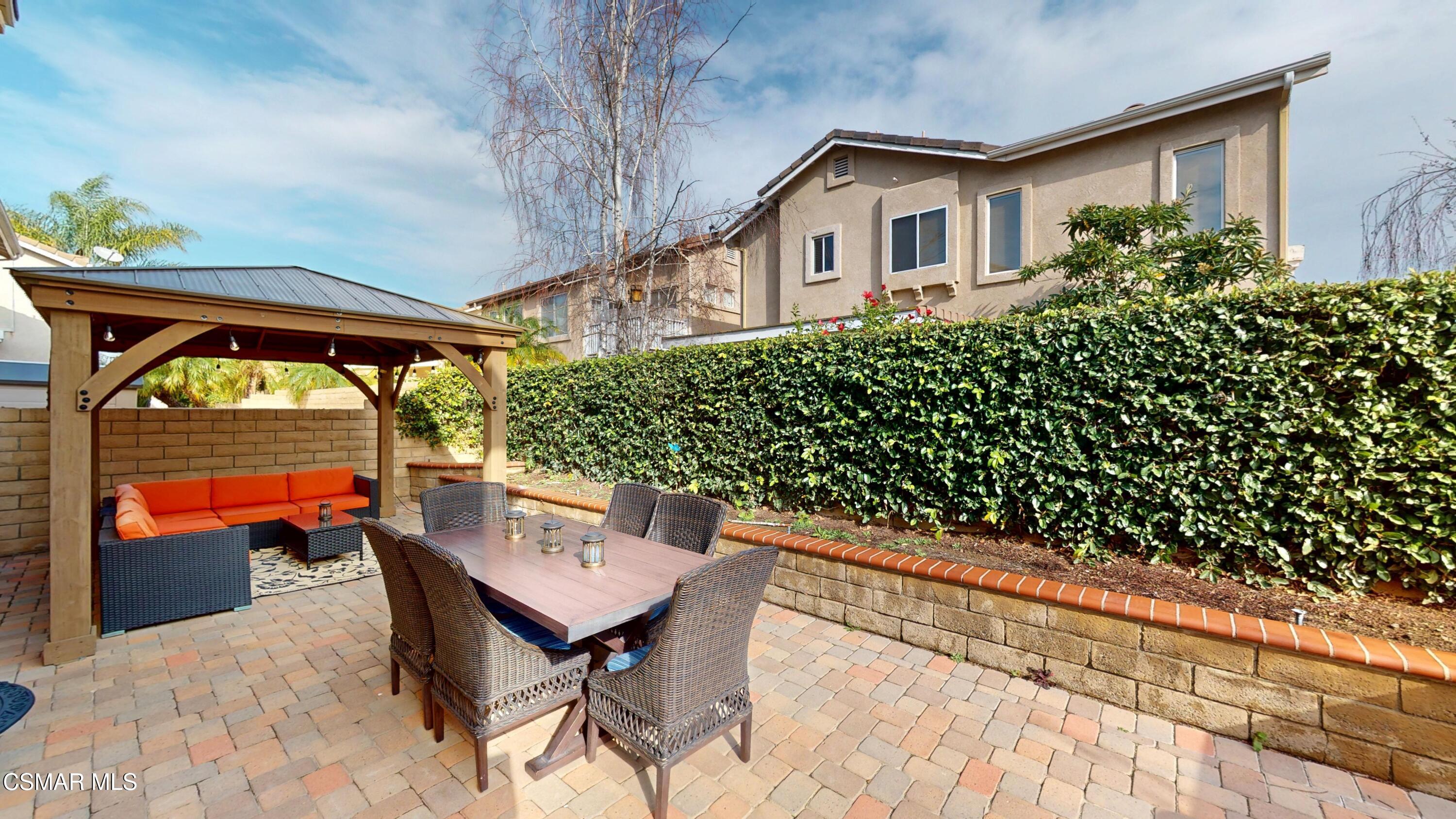 1708 Starpine Way Simi Valley, CA 93065 - Photo 53 of 60 a view of a chairs and table in patio of a house