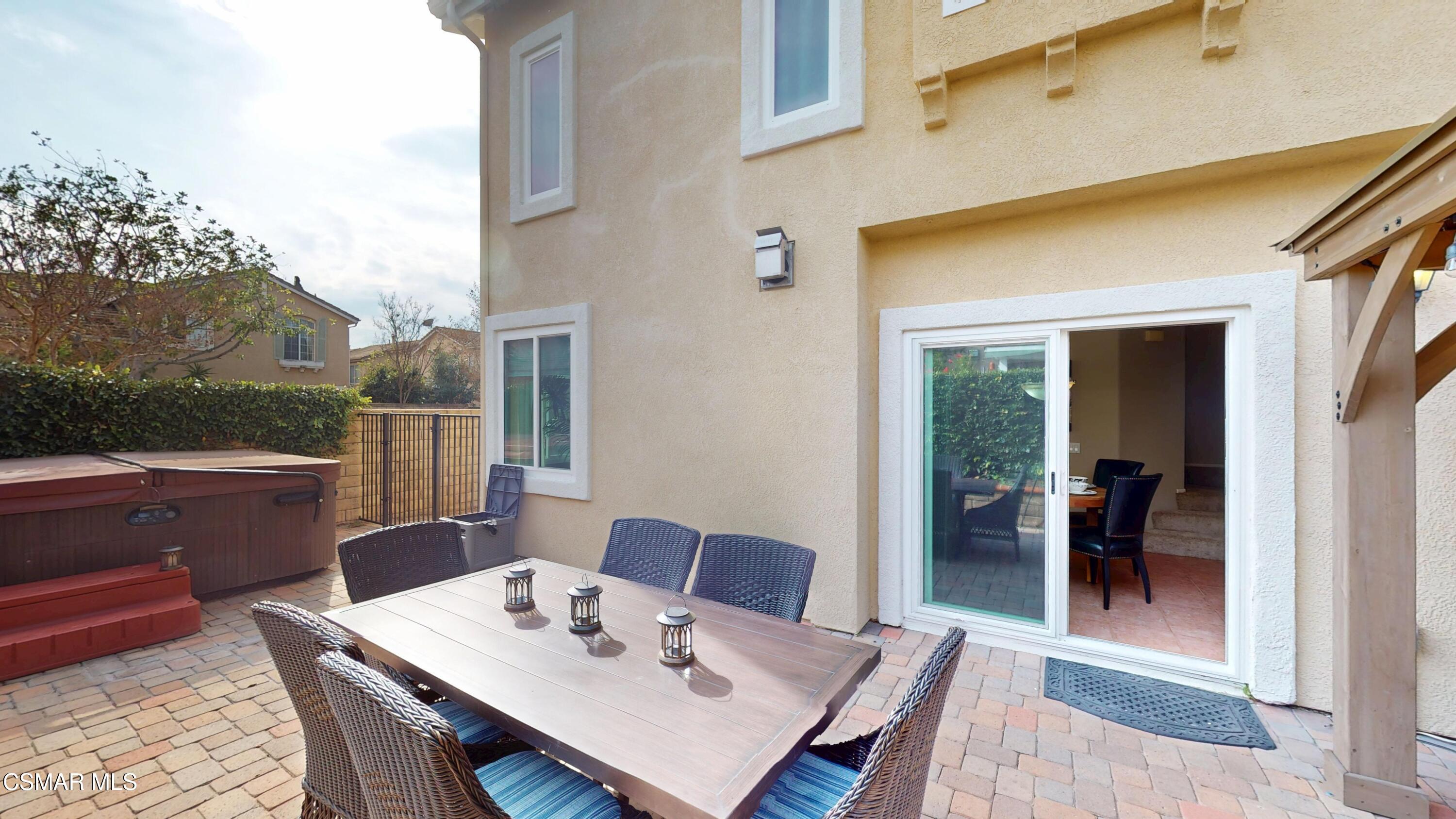 1708 Starpine Way Simi Valley, CA 93065 - Photo 55 of 60 a view of a dining table and chairs in the balcony