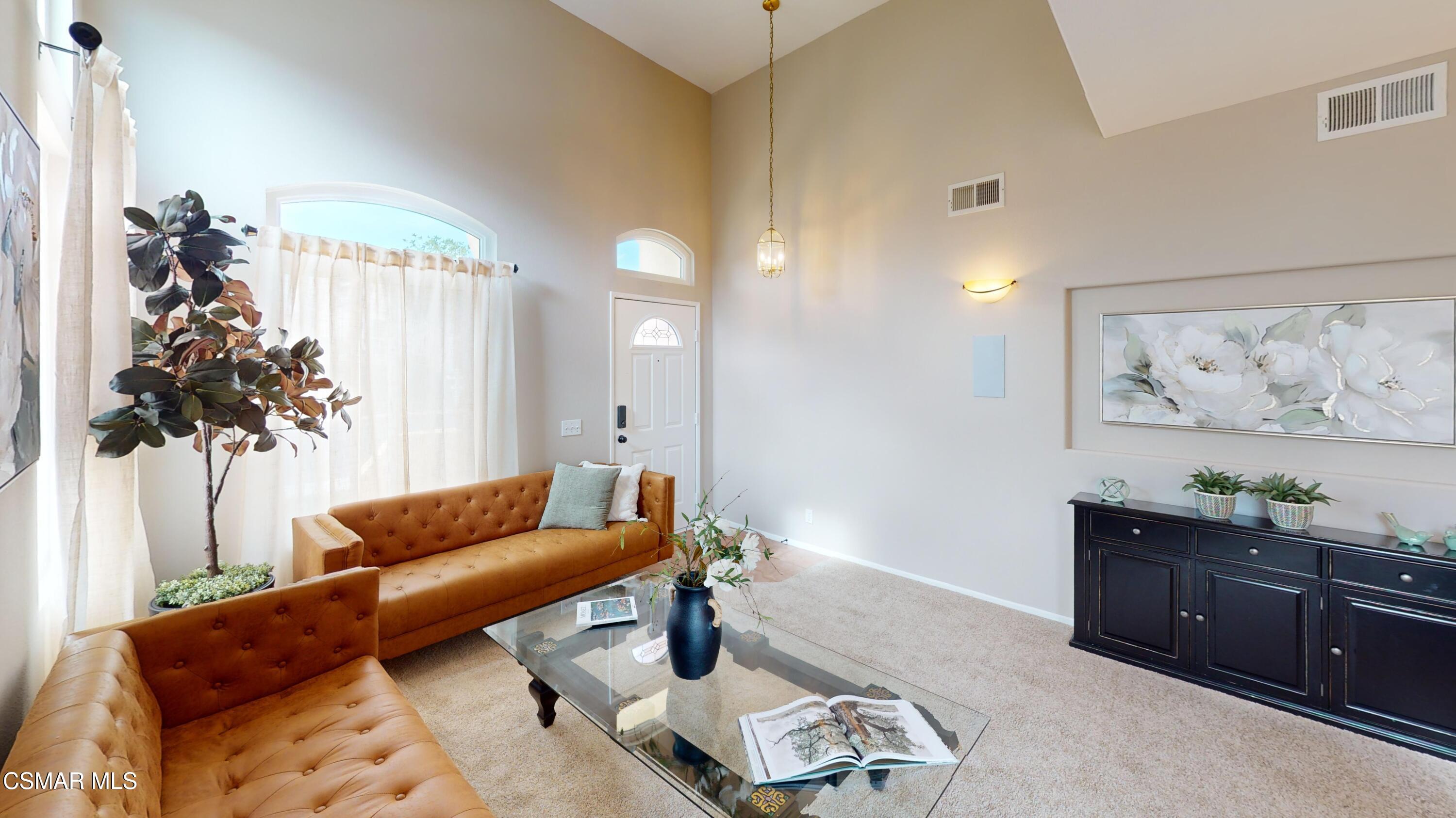 1708 Starpine Way Simi Valley, CA 93065 - Photo 7 of 60 a living room with furniture and a potted plant