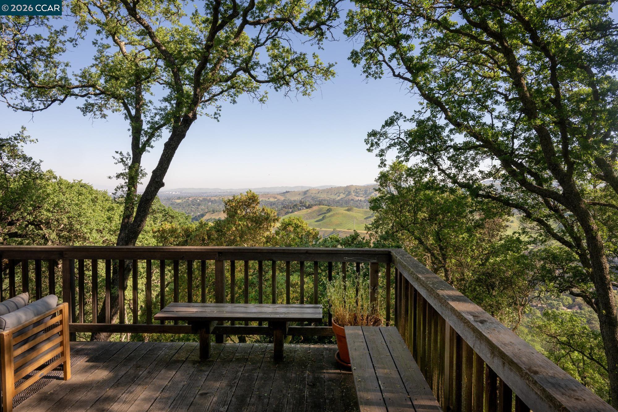 289 Castle Crest Road Alamo, CA 94507 - Photo 13 of 57 a balcony with wooden floor and fence