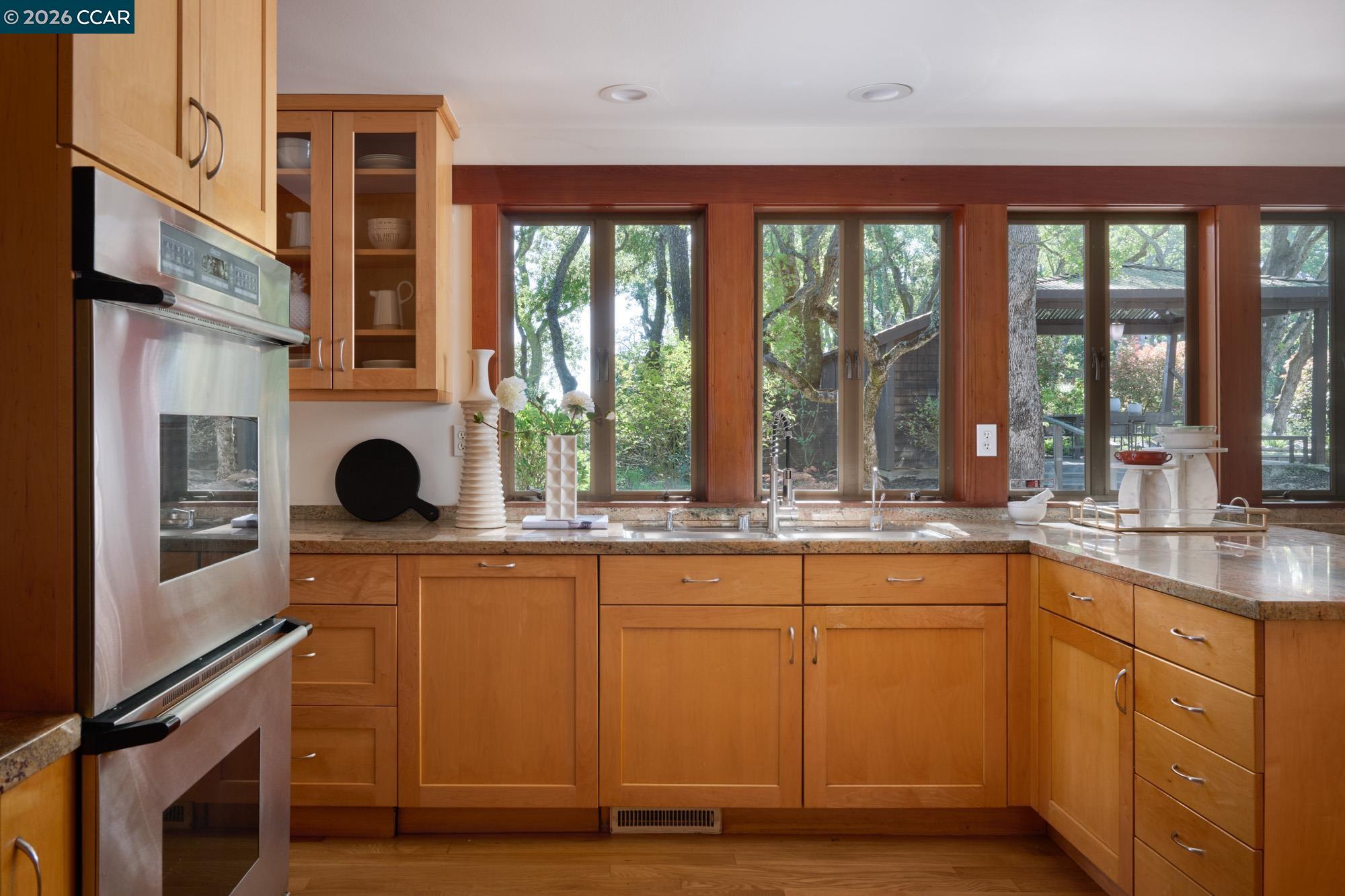 289 Castle Crest Road Alamo, CA 94507 - Photo 18 of 57 a kitchen with a sink and large window