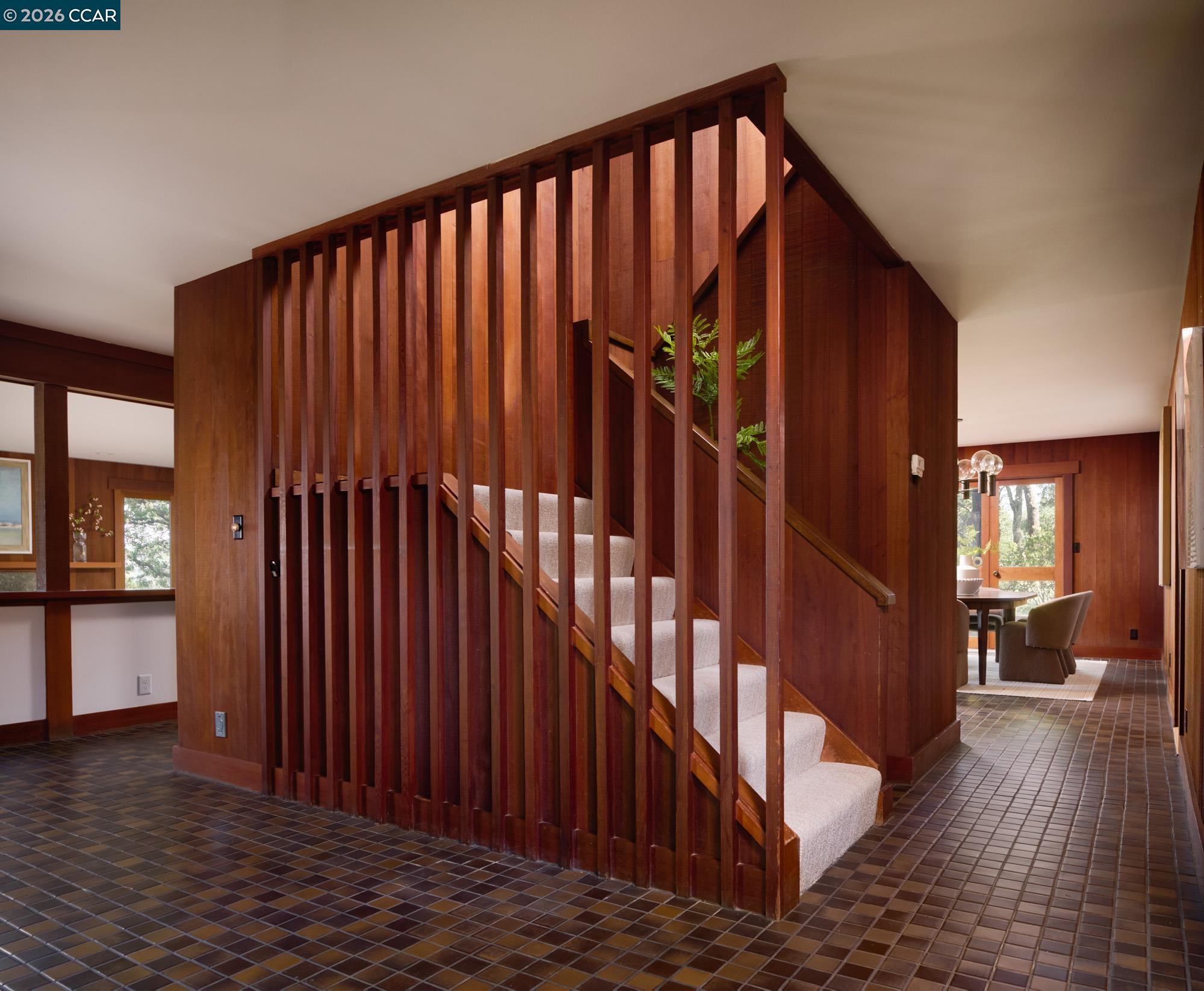 289 Castle Crest Road Alamo, CA 94507 - Photo 29 of 57 a view of a hallway with wooden floor and stairs