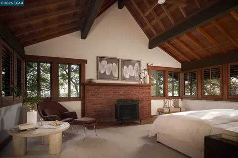 a kitchen with a sink and large window