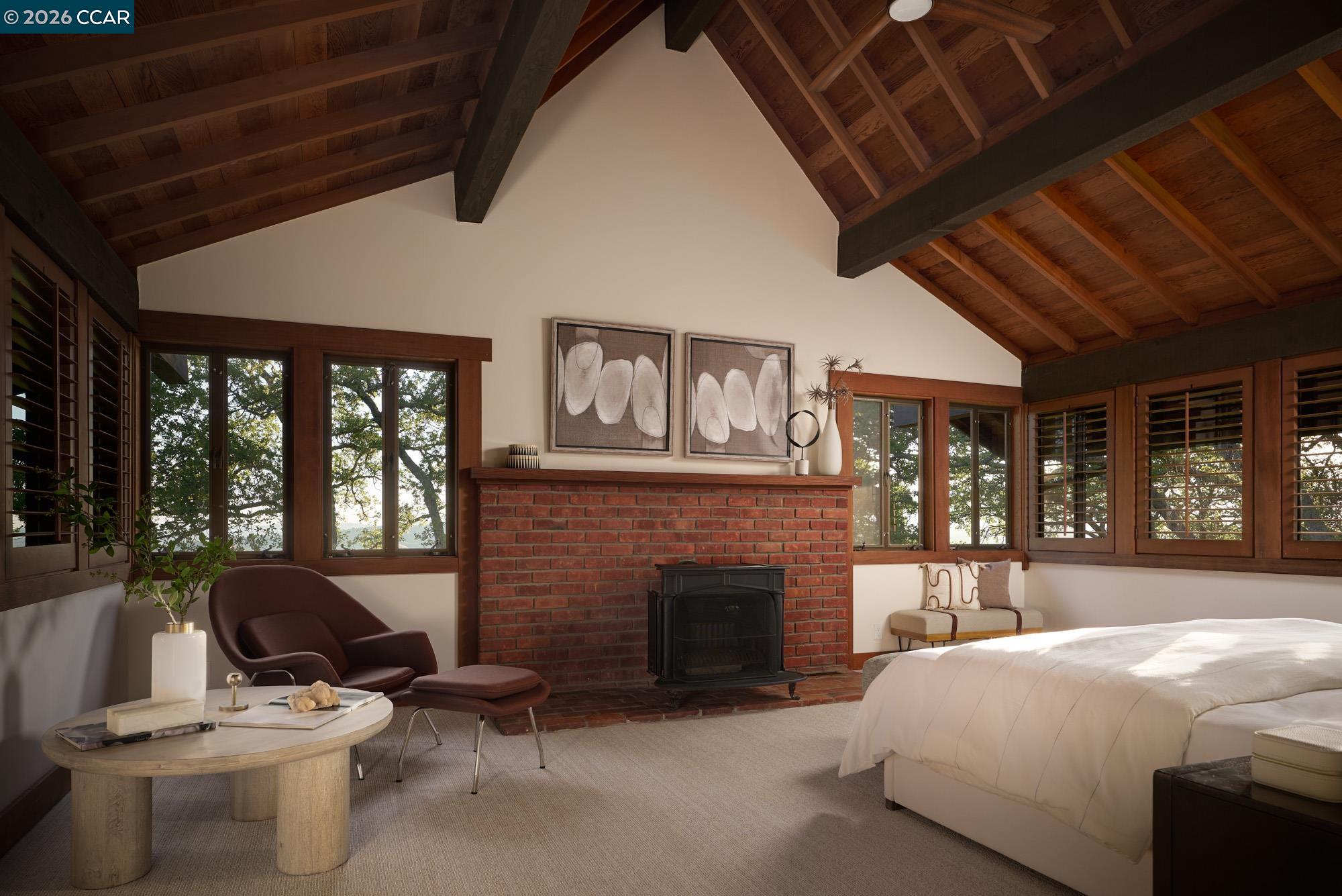 289 Castle Crest Road Alamo, CA 94507 - Photo 33 of 57 a bedroom with furniture and a fireplace