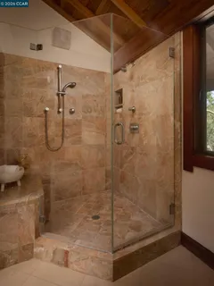 a view of swimming pool with a yard and trees